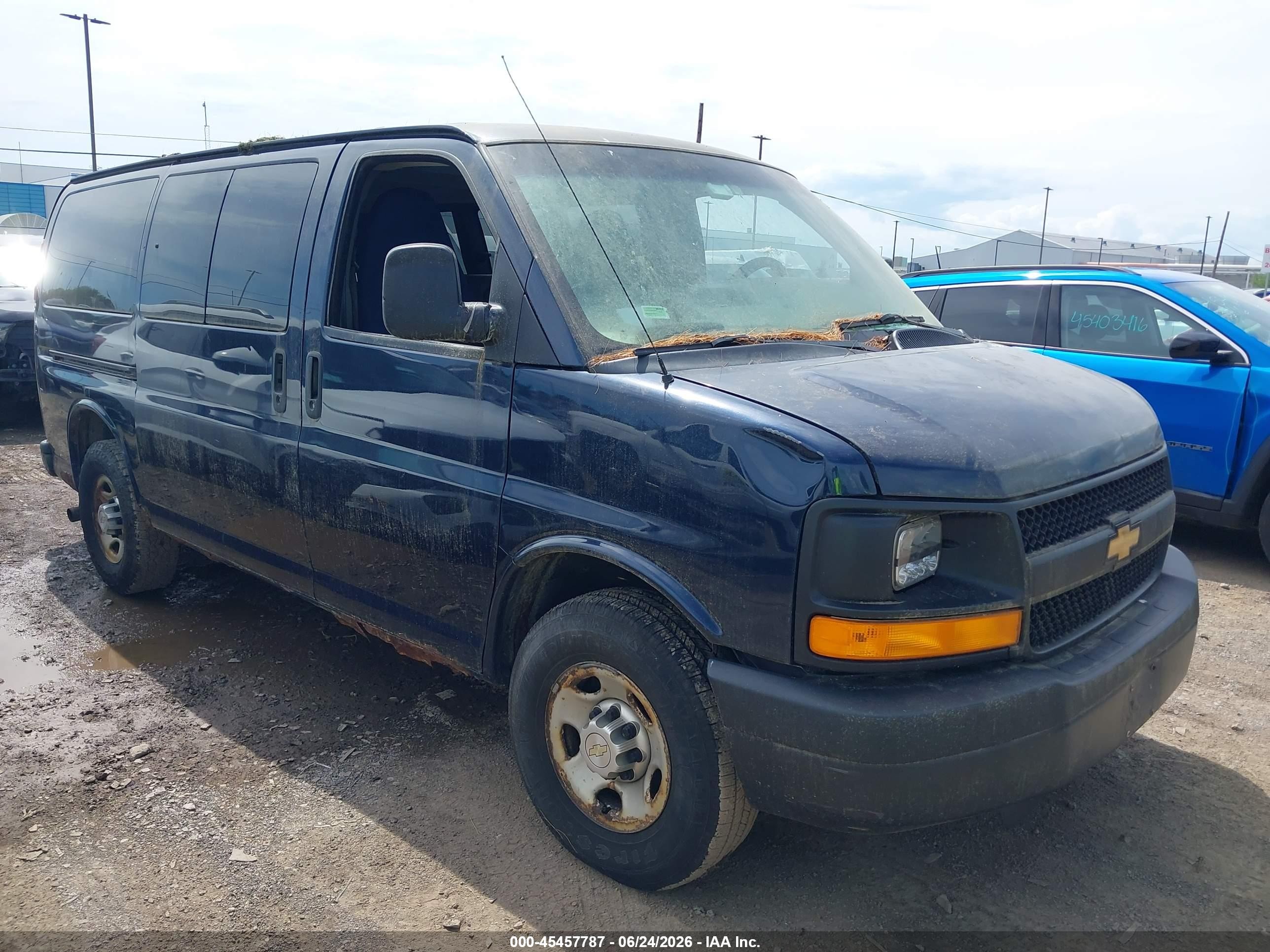 2012 Chevrolet Express Passenger 1LS, VIN 1GAWGPFA6C1132248 — Normal wear