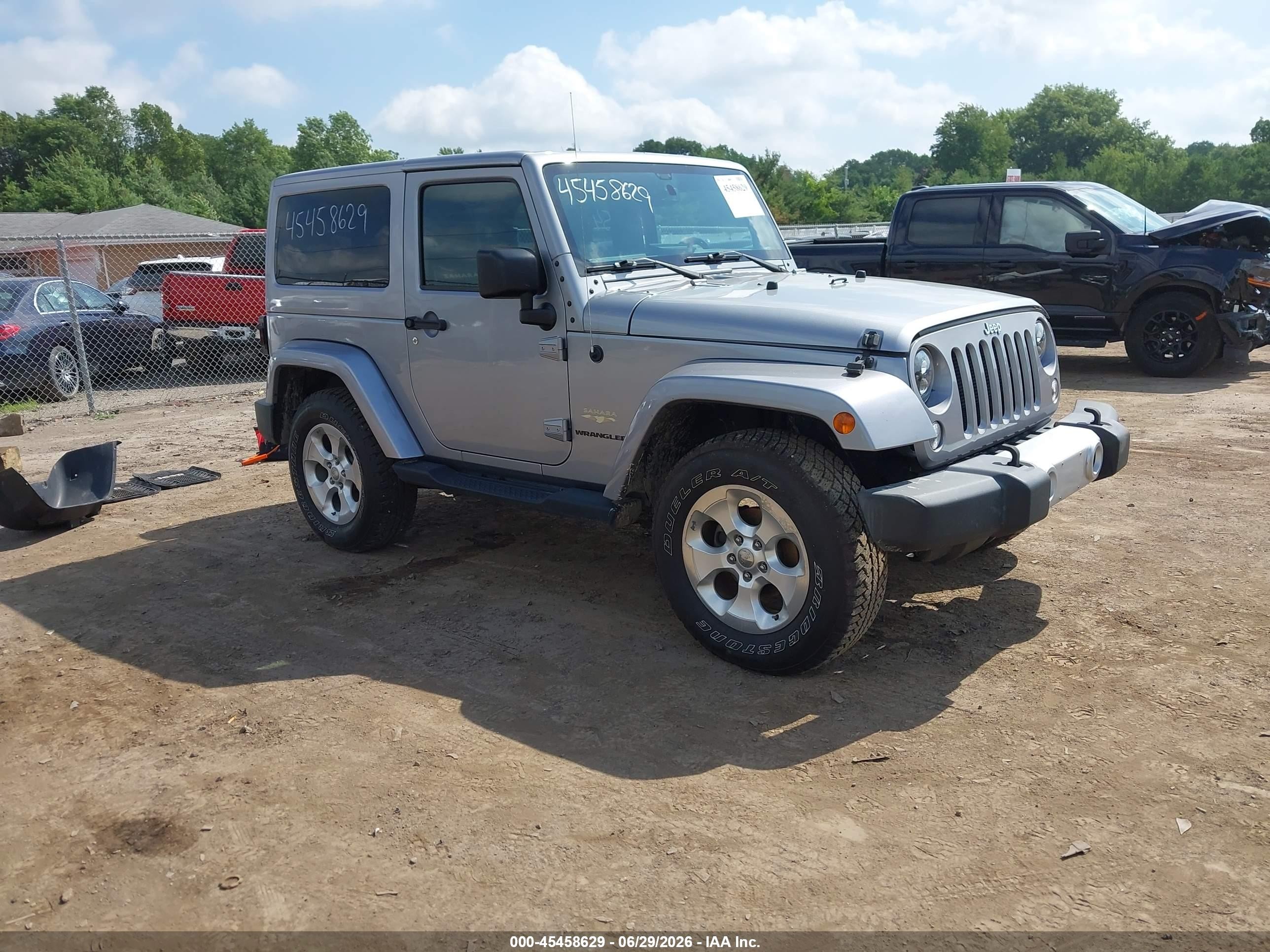 2015 Jeep Wrangler Sahara, VIN 1C4AJWBG1FL705363 — Side