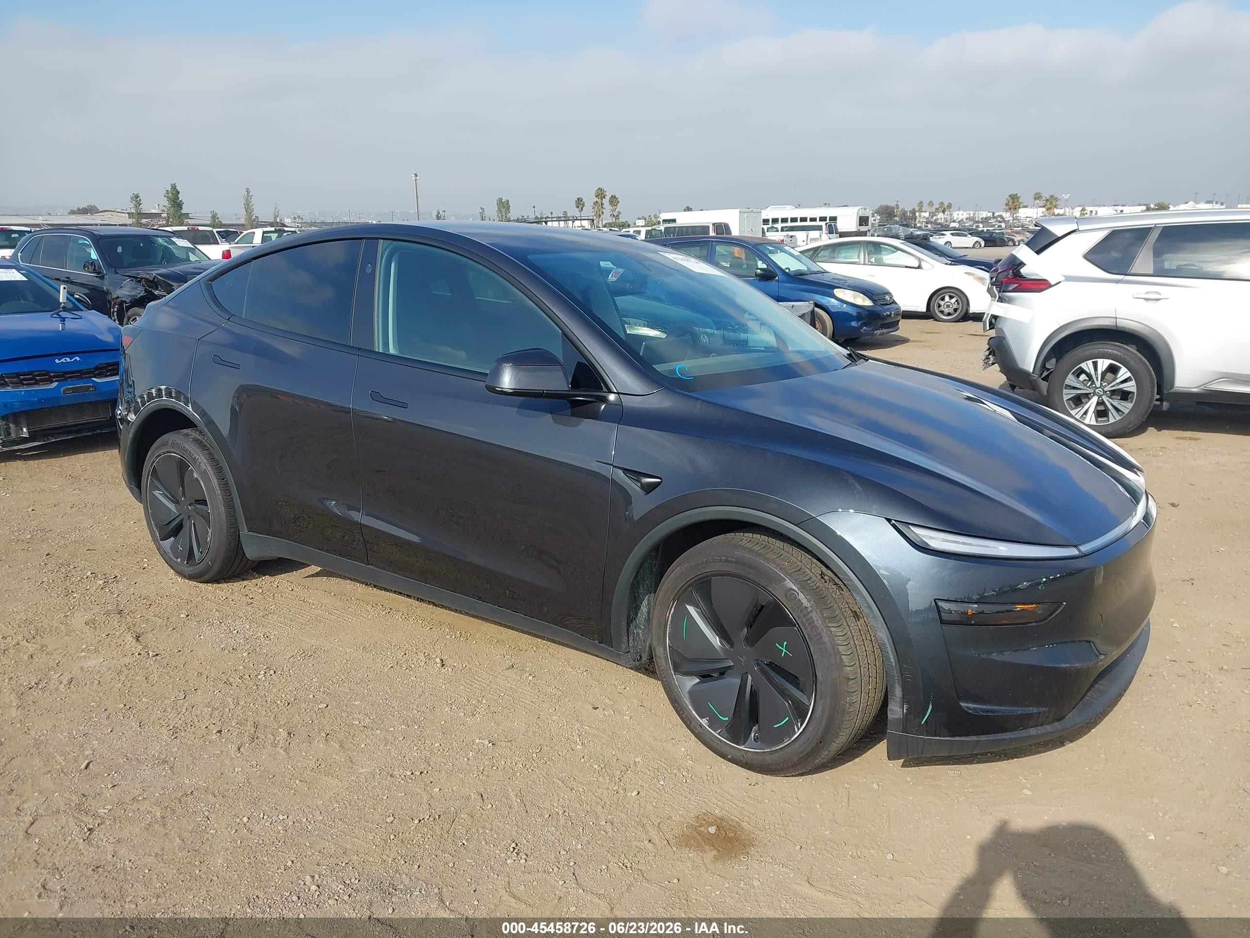 2026 Tesla Model Y Long Range, VIN 7SAYGDED0TF461032 — Side