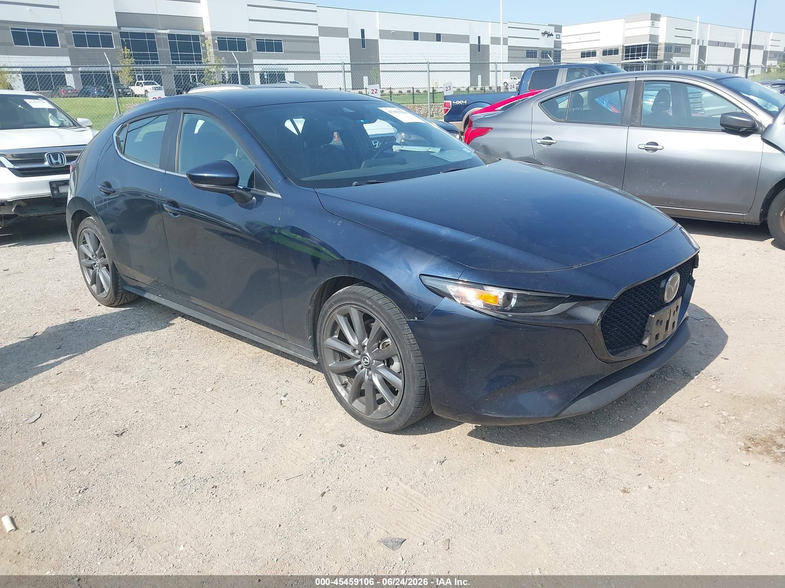 2019 Mazda 3 Preferred, VIN JM1BPBMM5K1136487 — Side