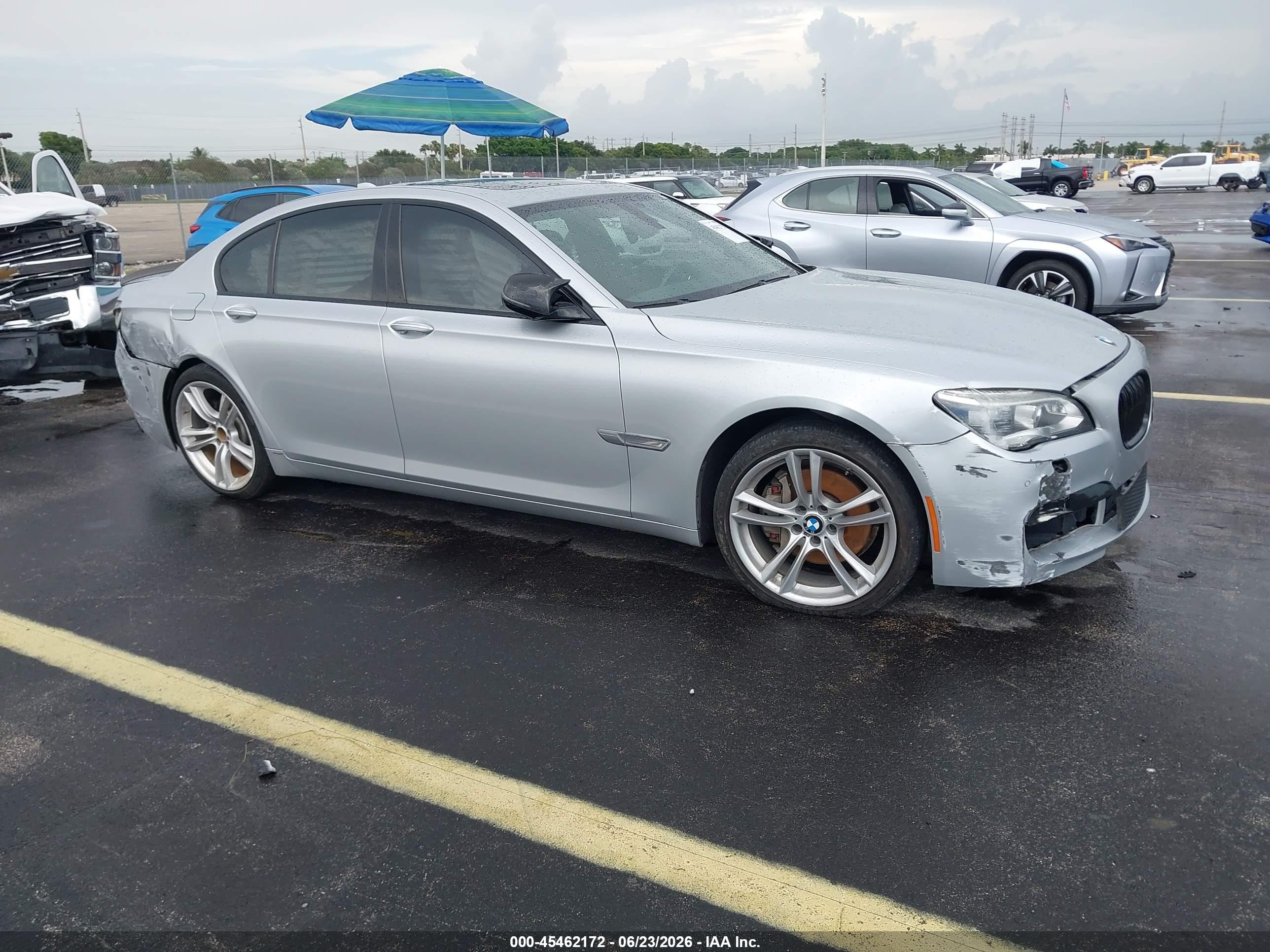 2015 BMW 7 Series 740i, VIN WBAYA6C5XFD826928 — Side