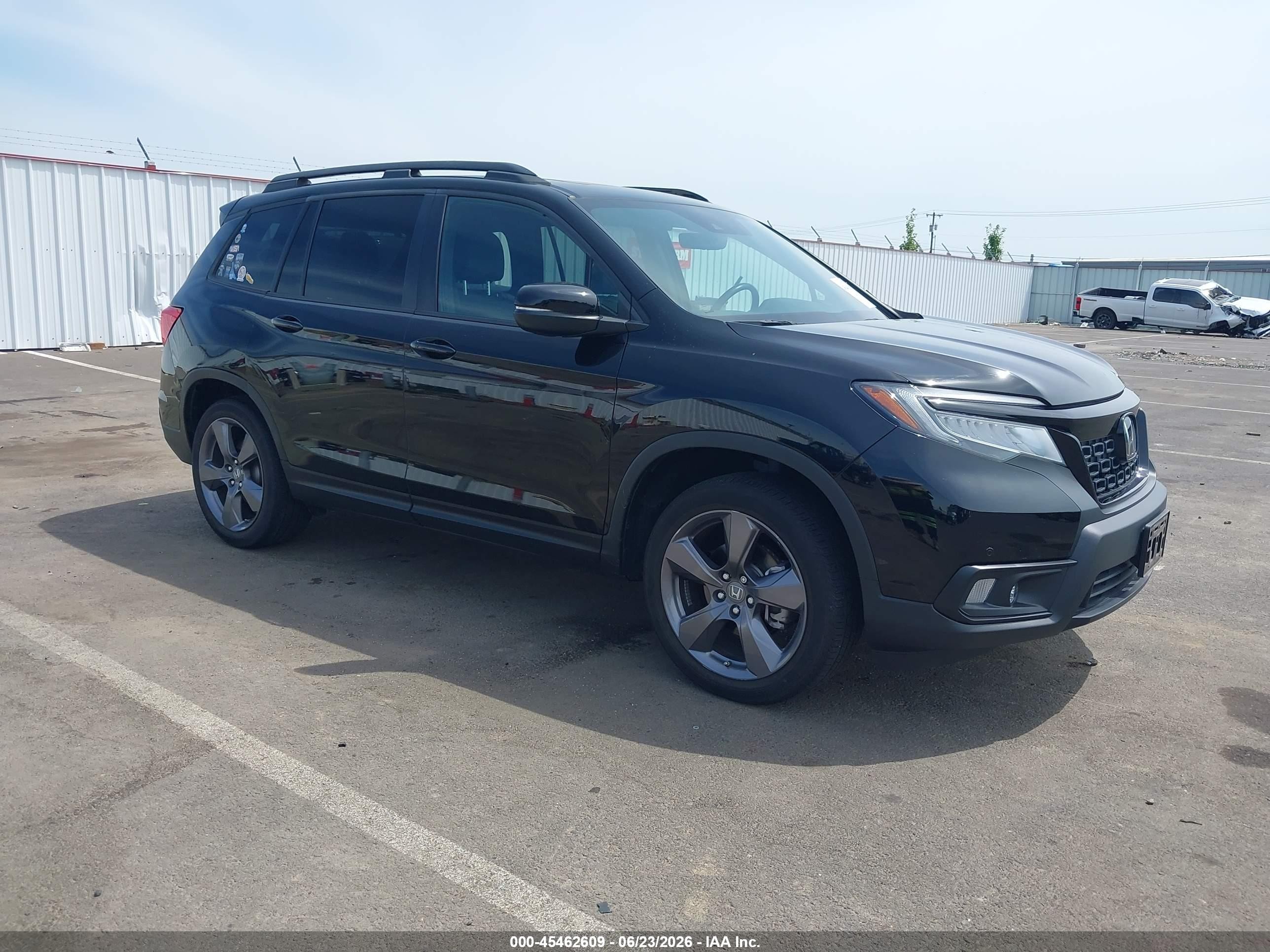 2021 Honda Passport Touring, VIN 5FNYF8H93MB036629 — Rear end