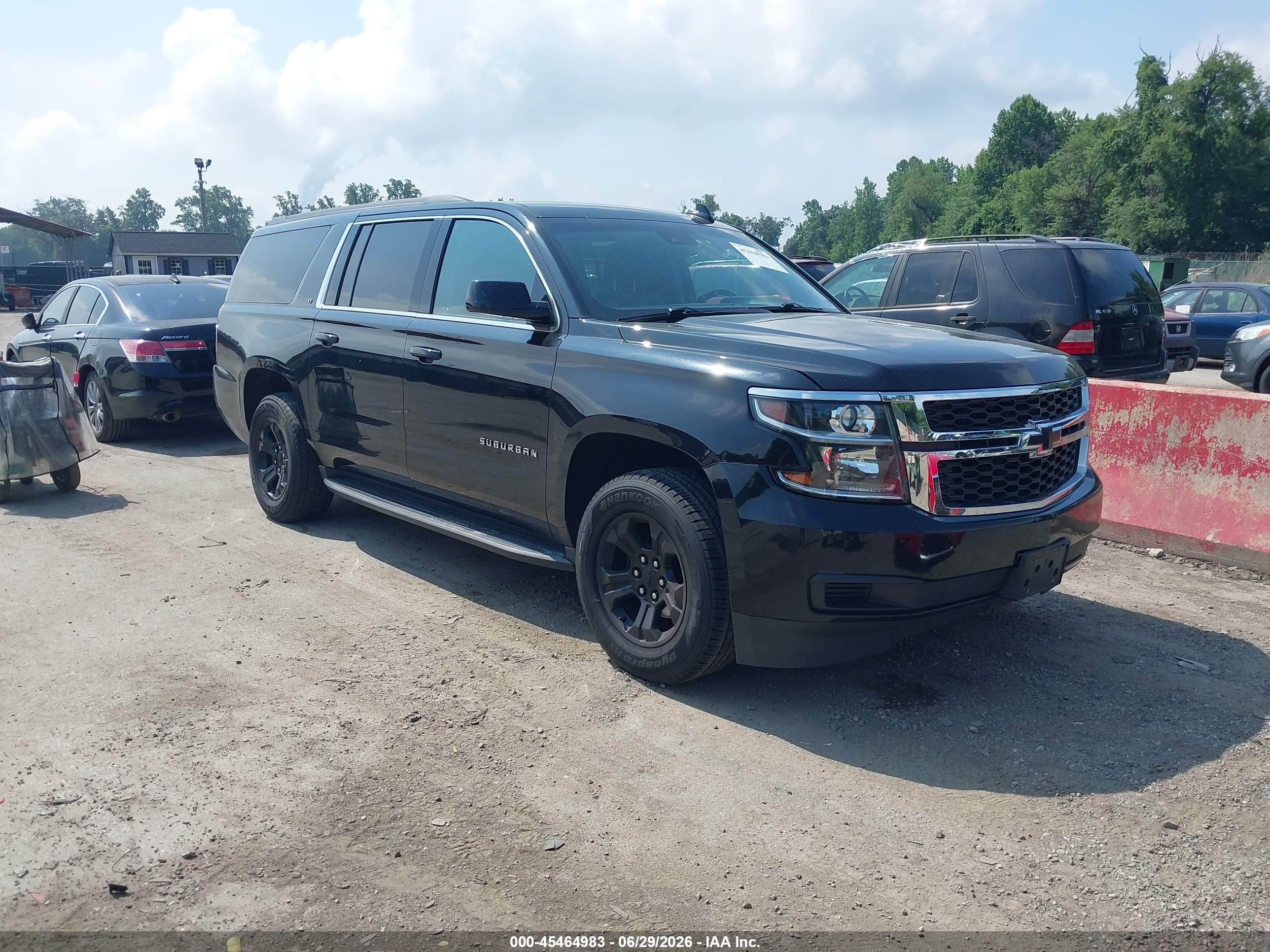 2019 Chevrolet Suburban LT, VIN 1GNSKHKC0KR367141 — Rear end