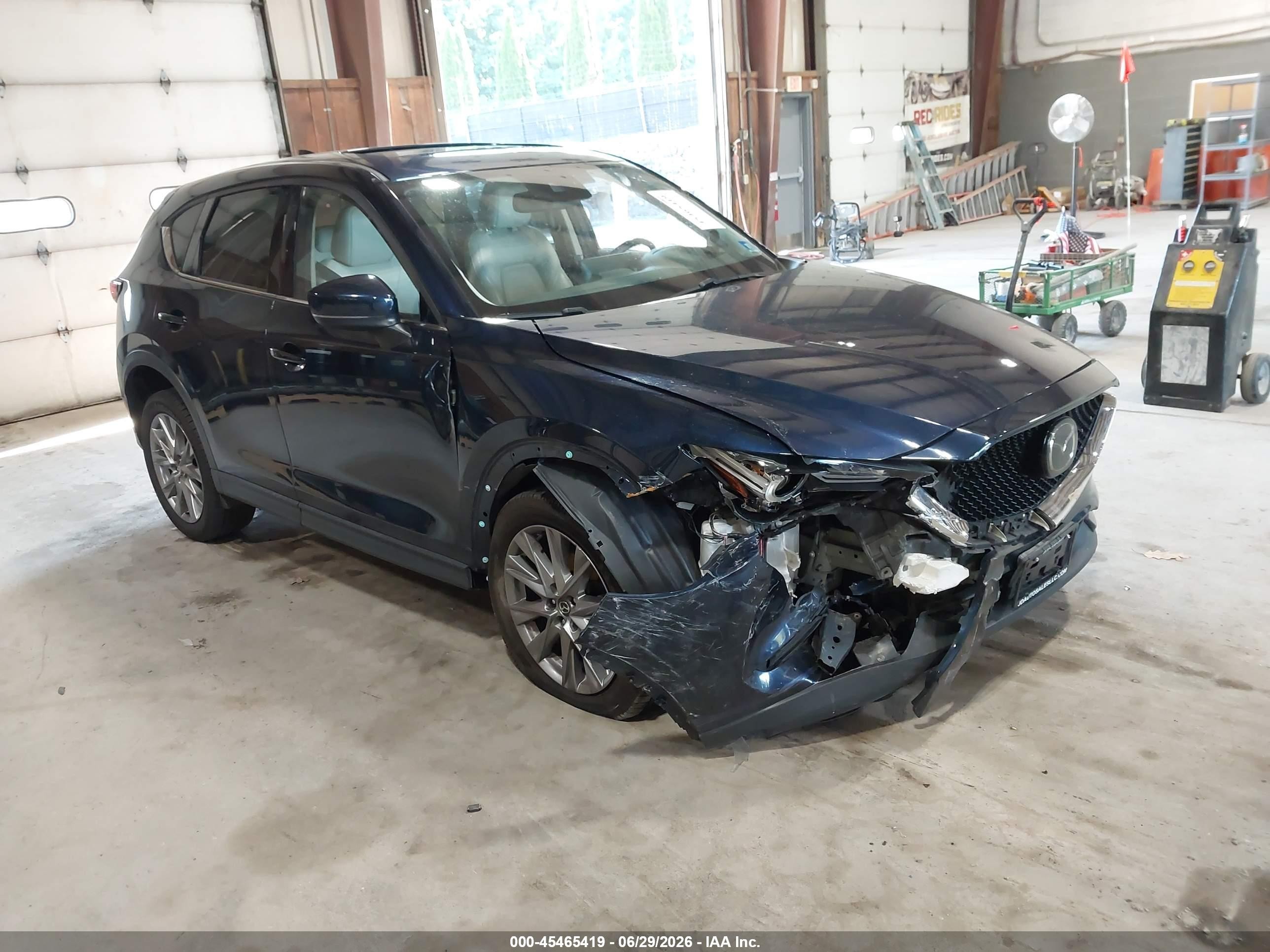 2021 Mazda CX-5 Grand Touring, VIN JM3KFBDM9M0307986 — Front end
