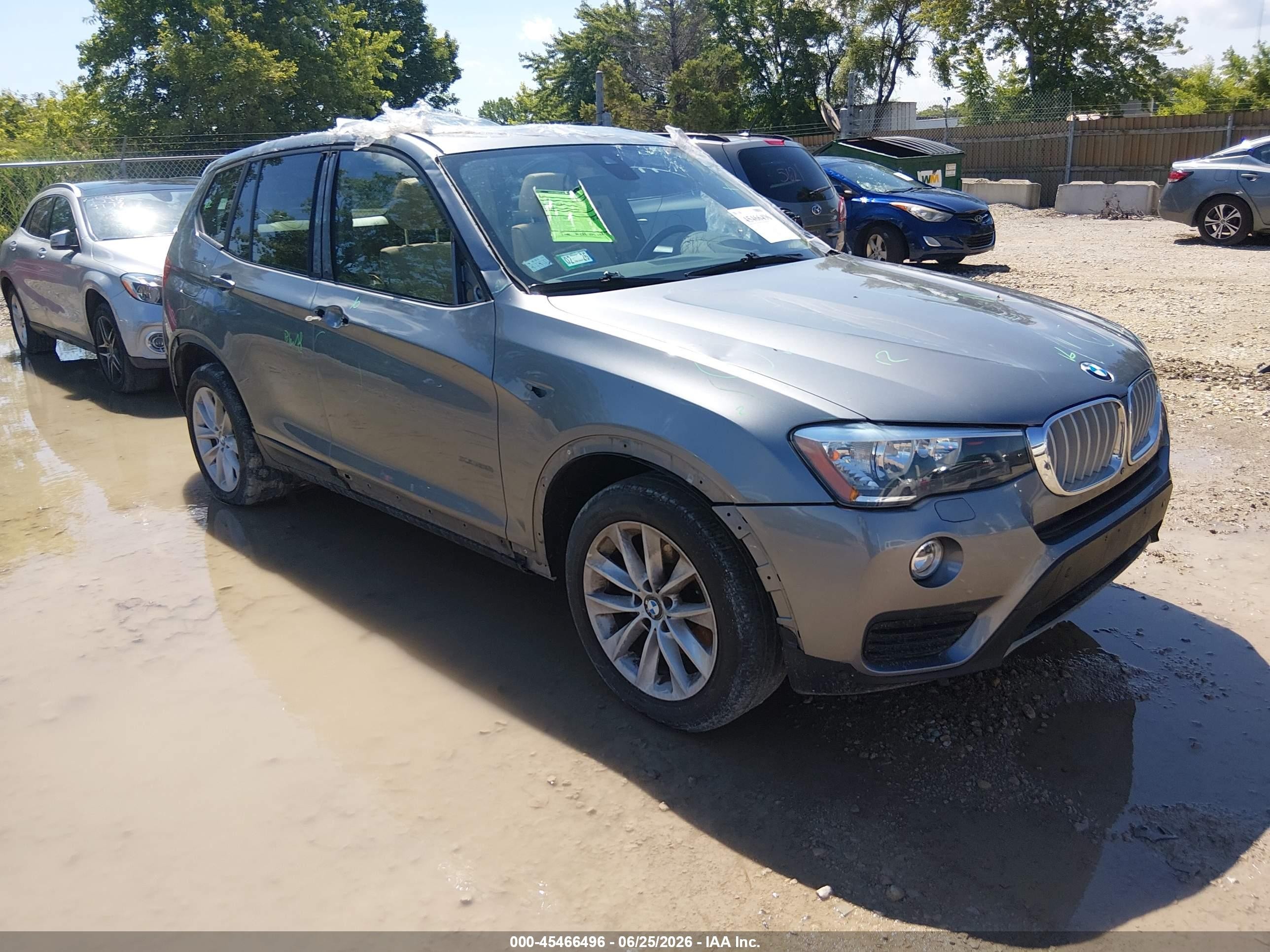 2017 BMW X3 xDrive28i, VIN 5UXWX9C53H0T11160 — Side