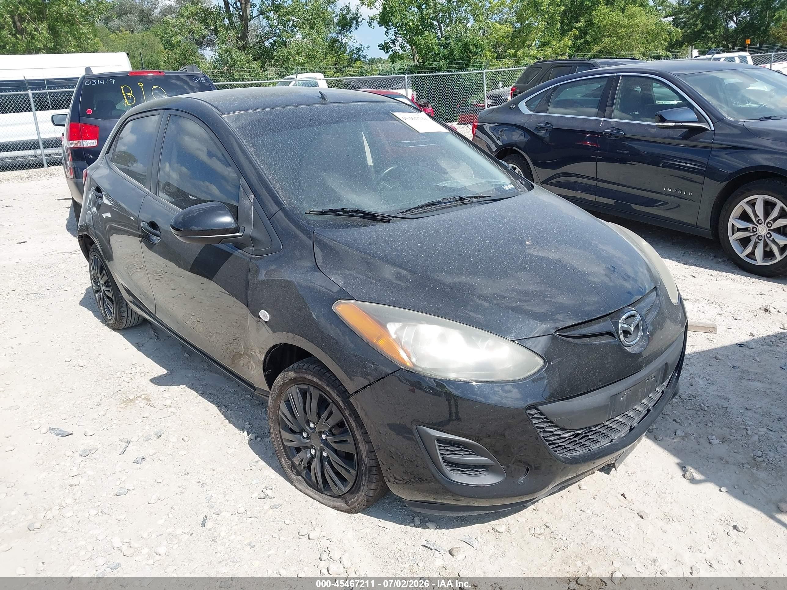 2013 Mazda 2 Sport, VIN JM1DE1KY2D0152976 — Зад