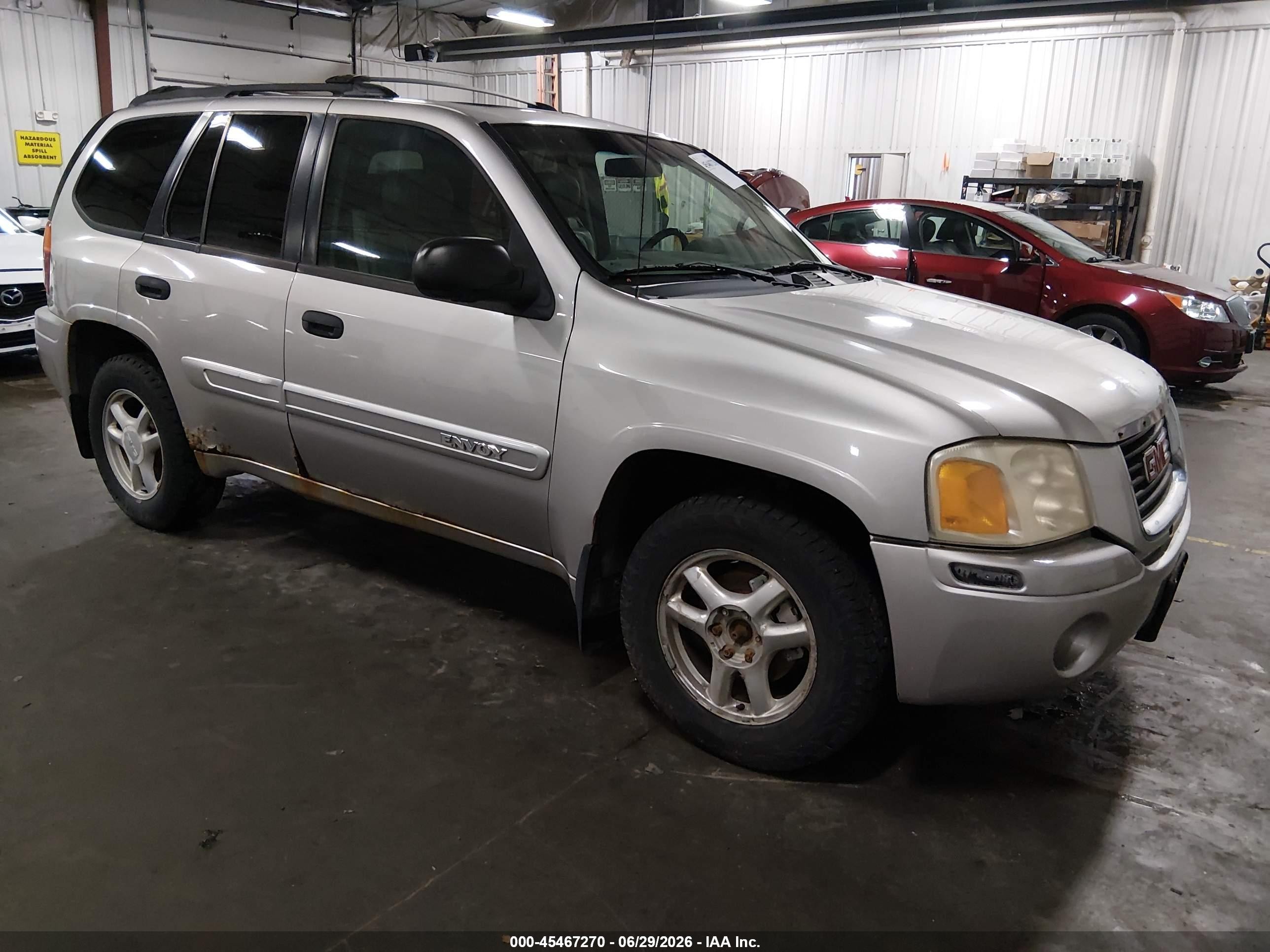 2004 GMC Envoy SLT, VIN 1GKDT13S442108681 — Side