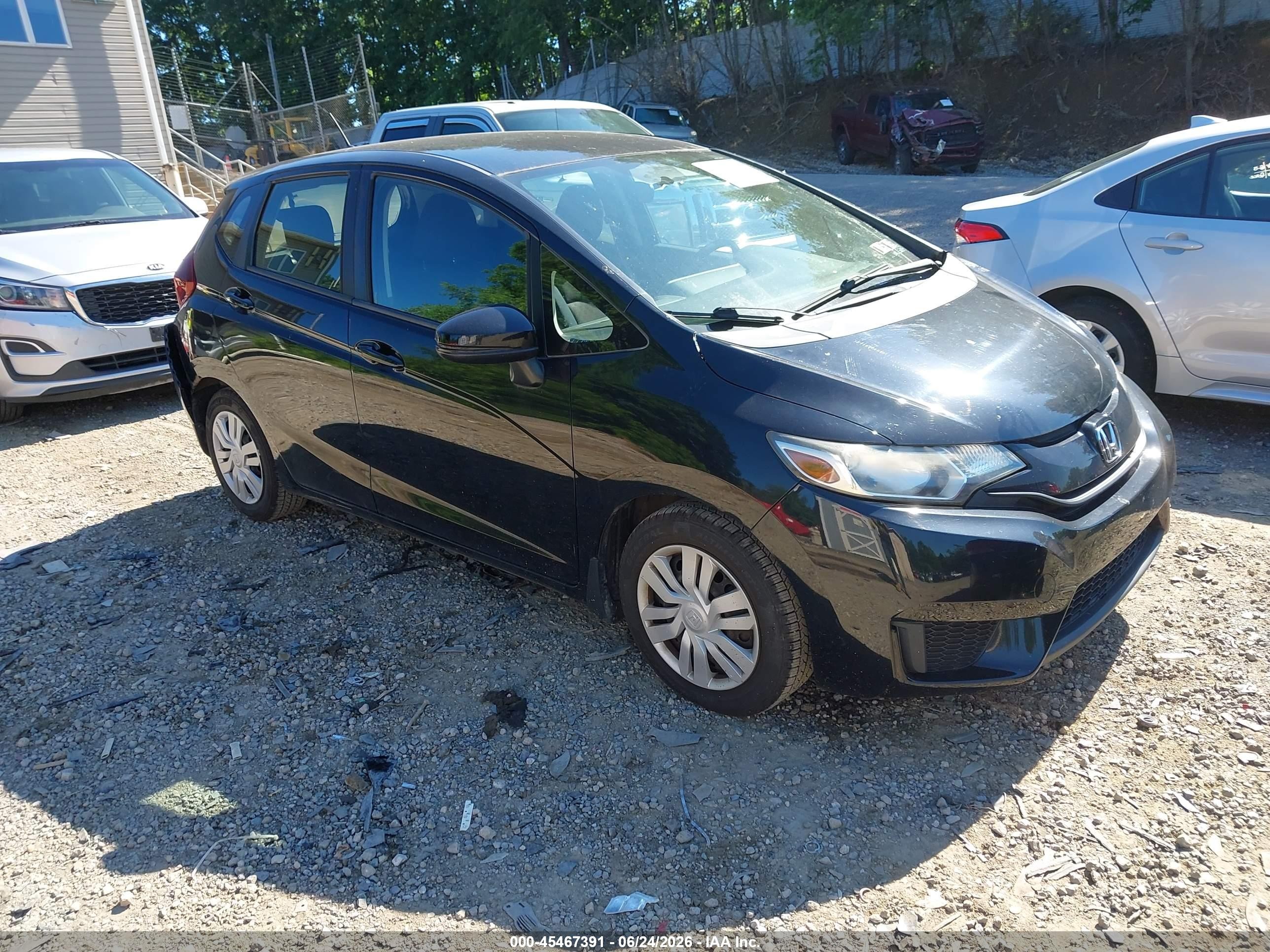 2016 Honda Fit LX, VIN JHMGK5H58GX004268 — Зад
