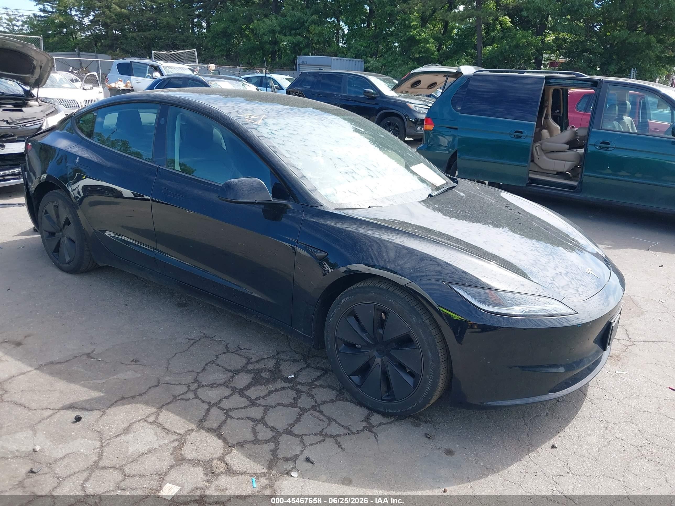 2024 Tesla Model 3 Long Range, VIN 5YJ3E1EB7RF844601 — Rear end