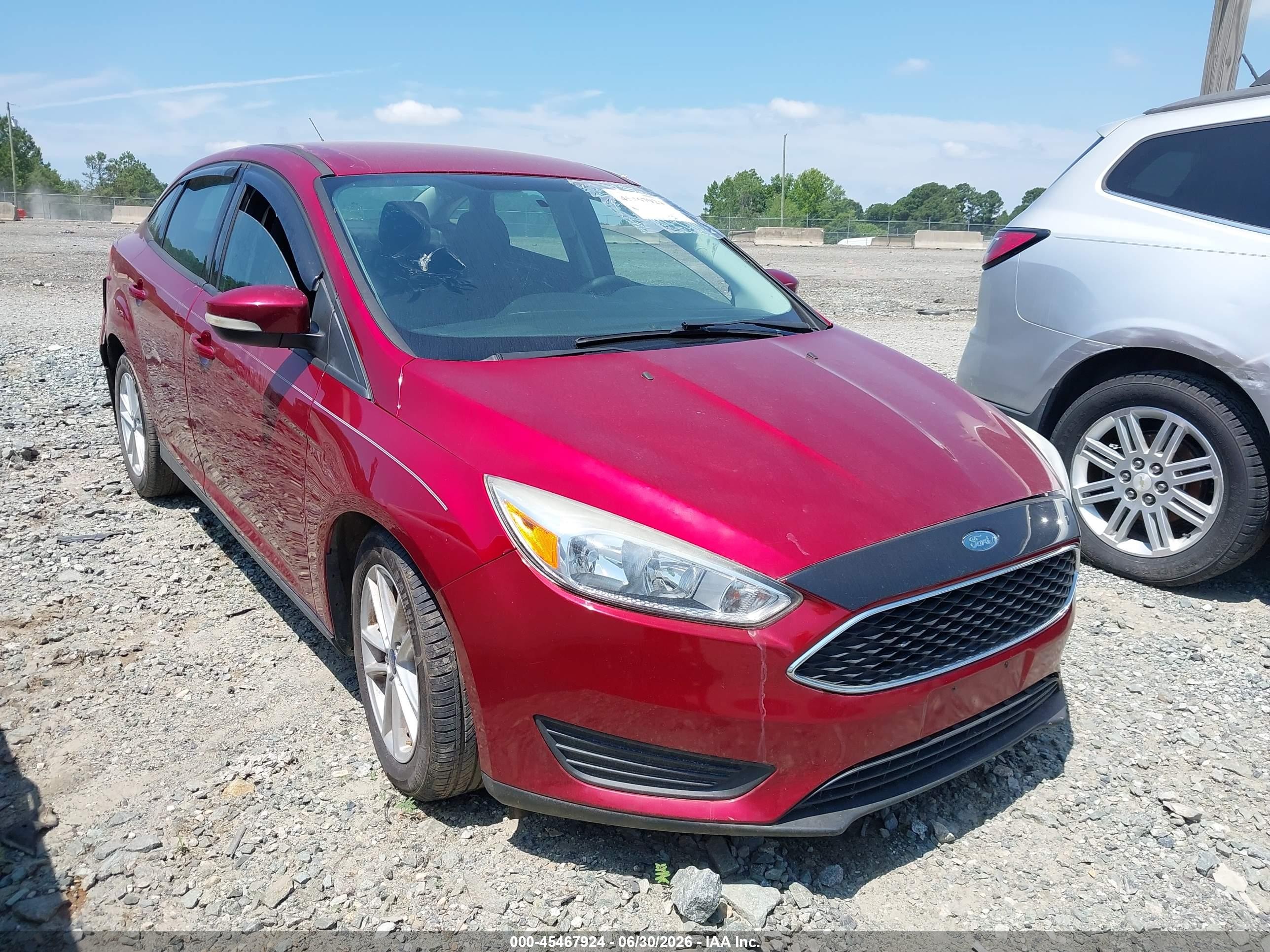 2017 Ford Focus SE, VIN 1FADP3F23HL234429 — Side