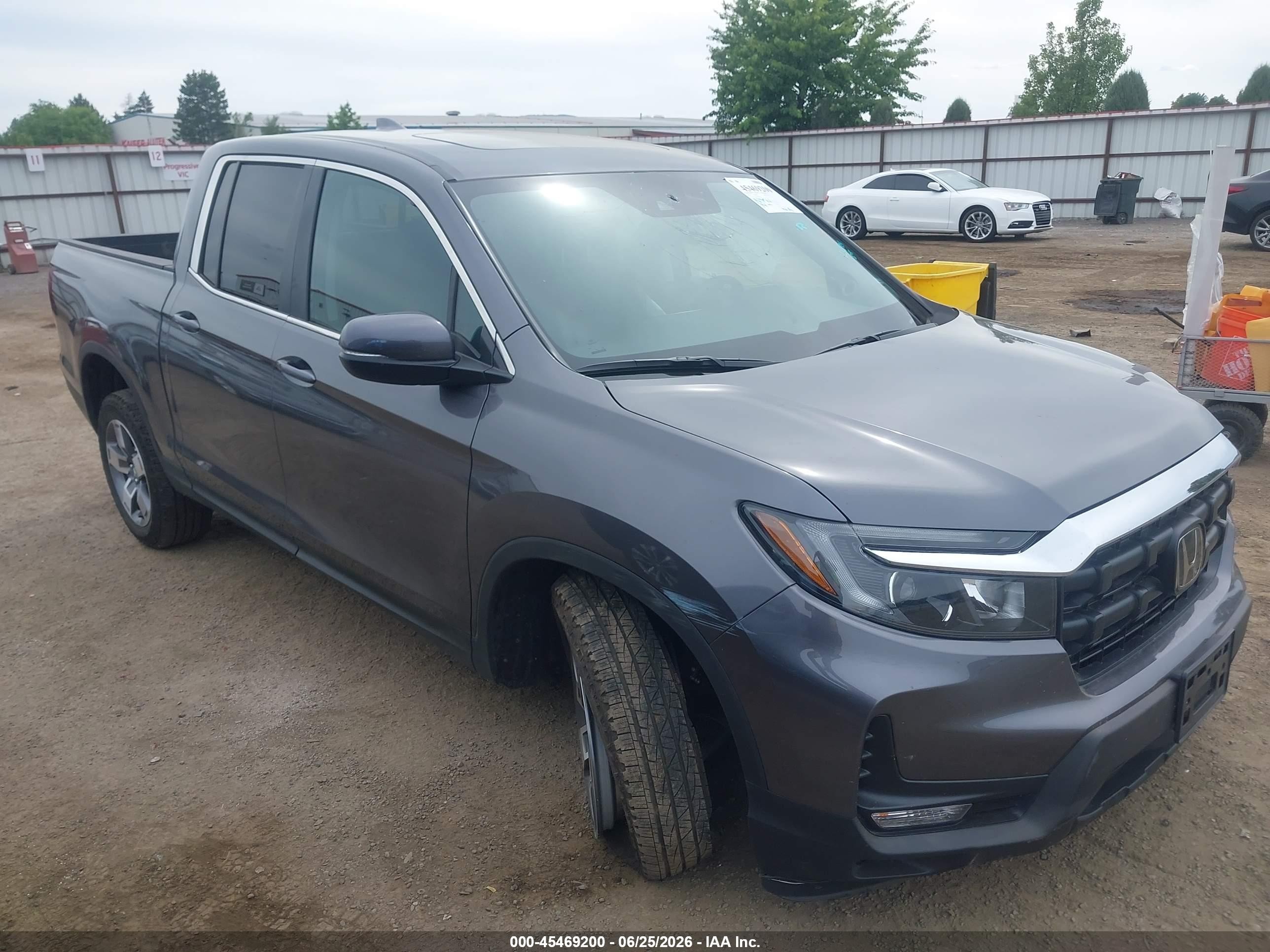 2026 Honda Ridgeline RTL, VIN 5FPYK3F50TB022868 — Side