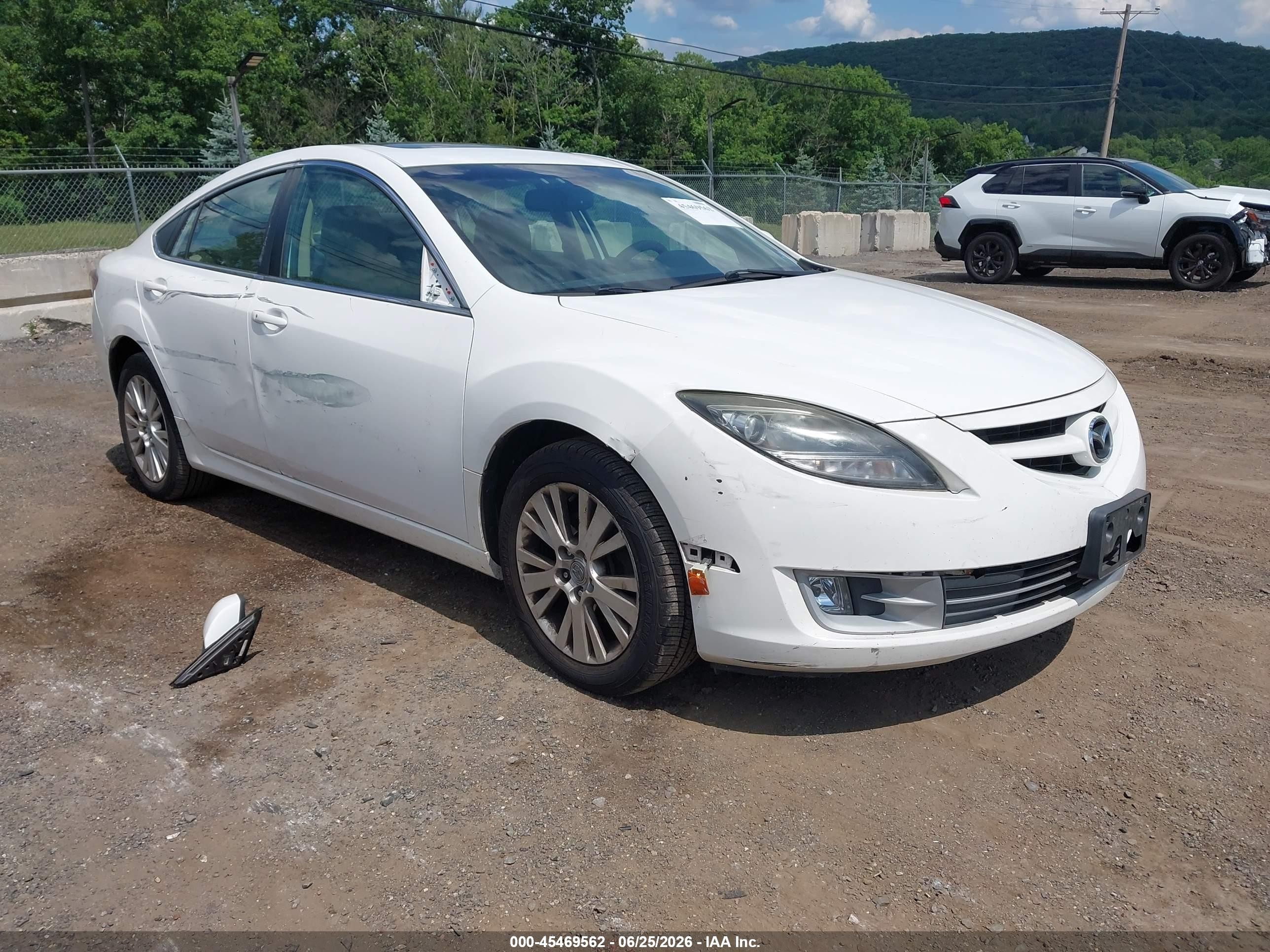 2010 Mazda 6 i Touring, VIN 1YVHZ8CH1A5M25489 — Side