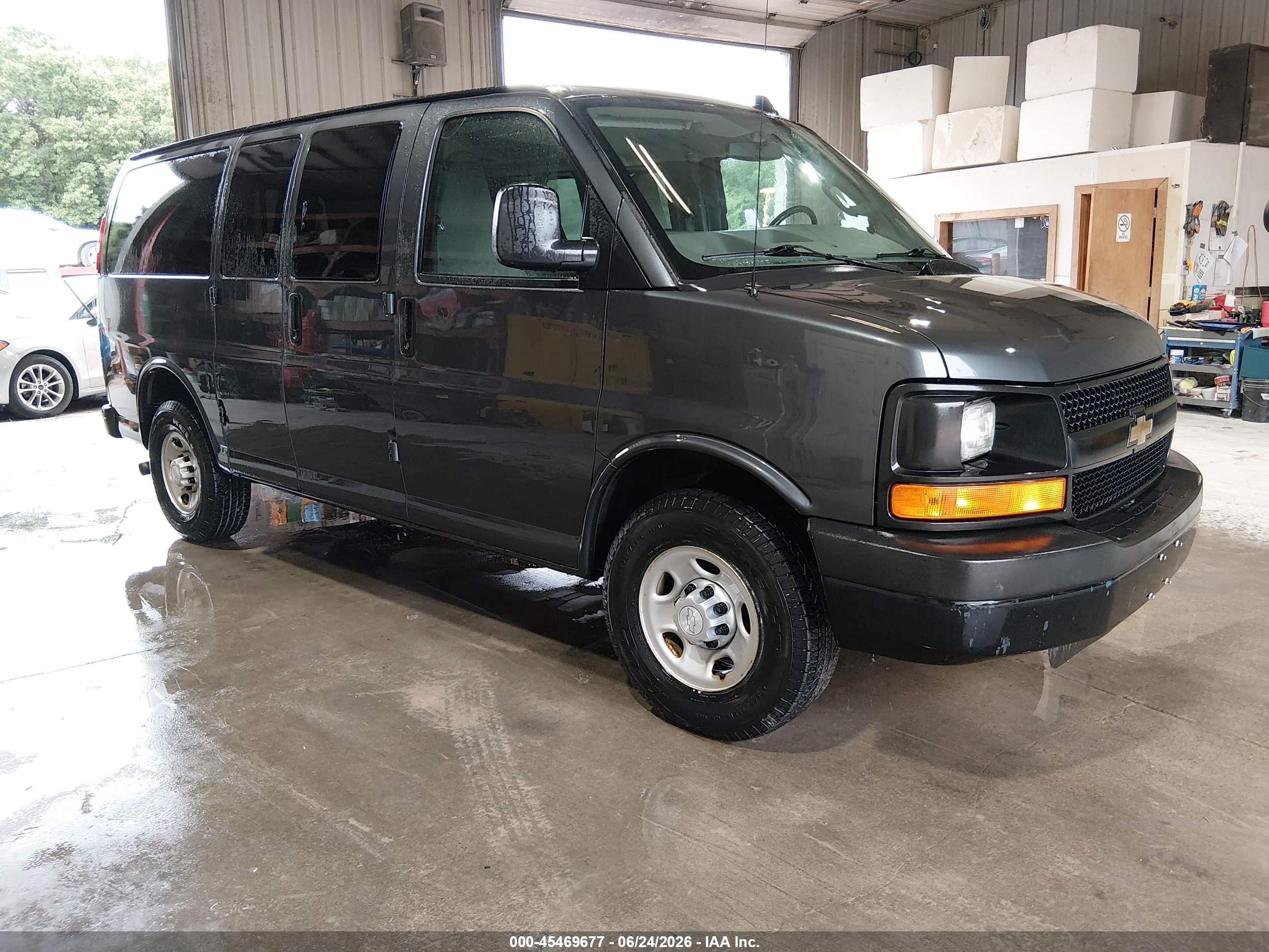 2016 Chevrolet Express Passenger LS, VIN 1GAWGEFG2G1242678 — Rear end