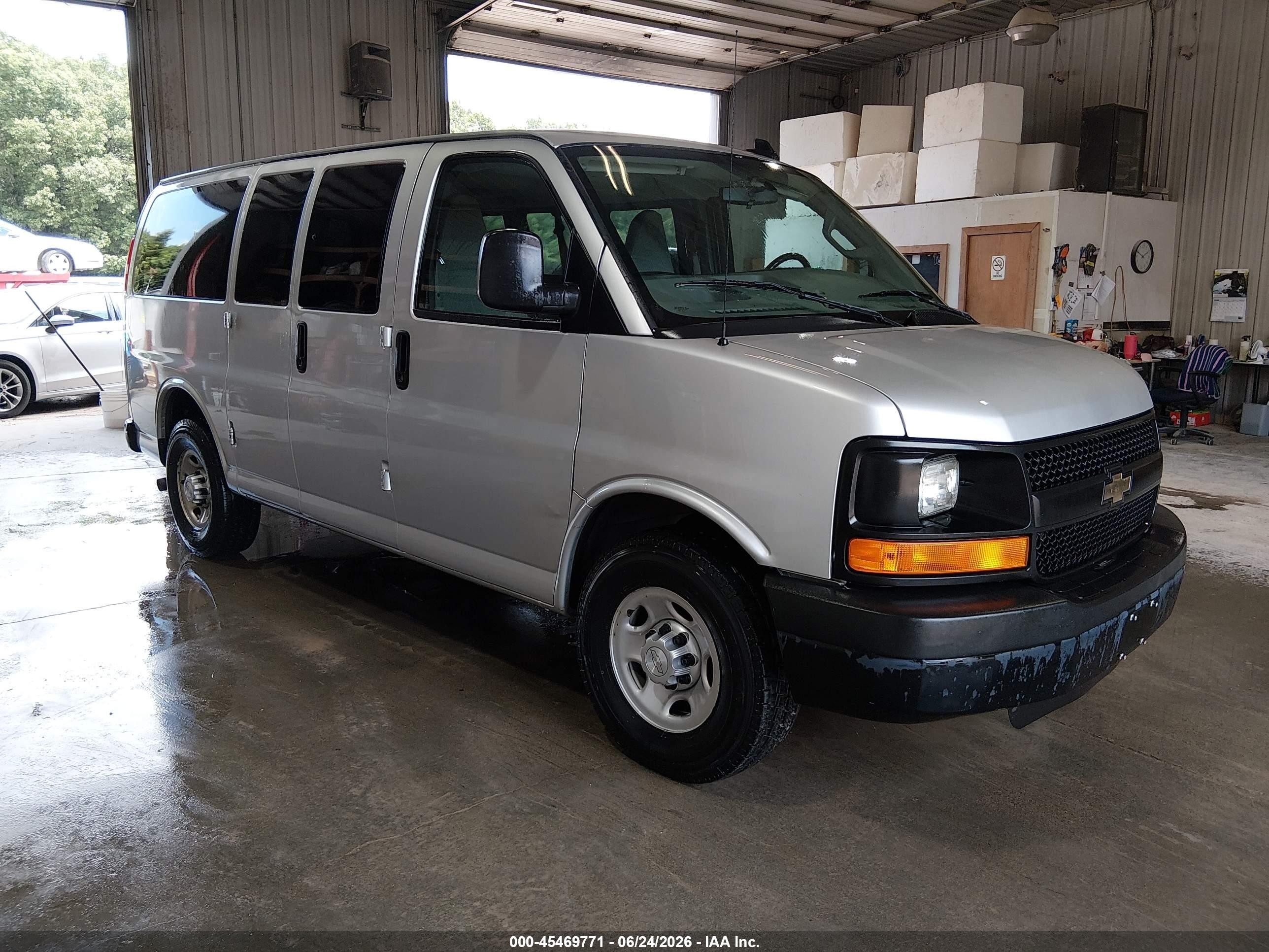 2016 Chevrolet Express Passenger LS, VIN 1GAWGEFG3G1243774 — Front end