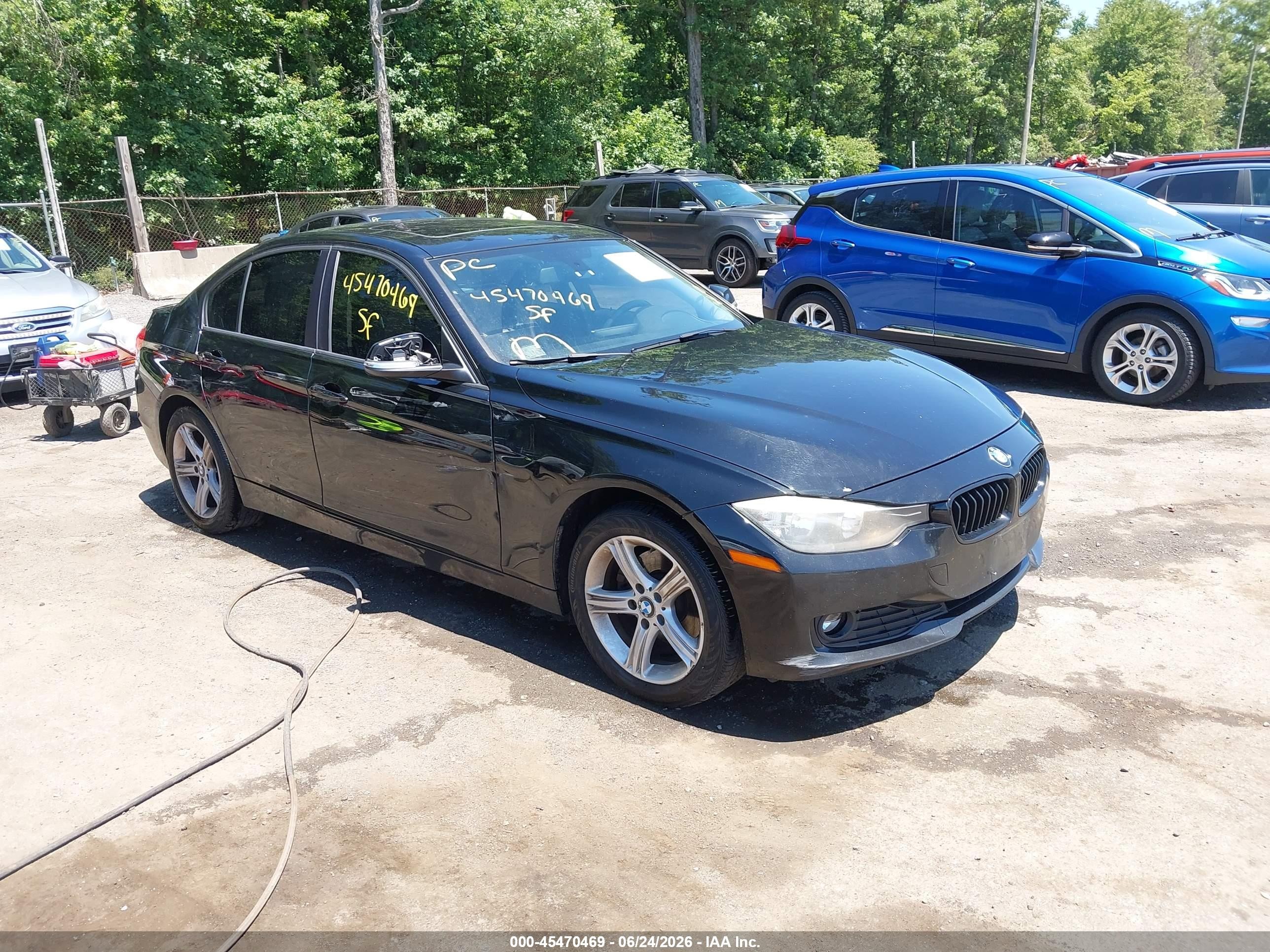 2014 BMW 3 Series 320i xDrive, VIN WBA3C3G58ENS68065 — Side