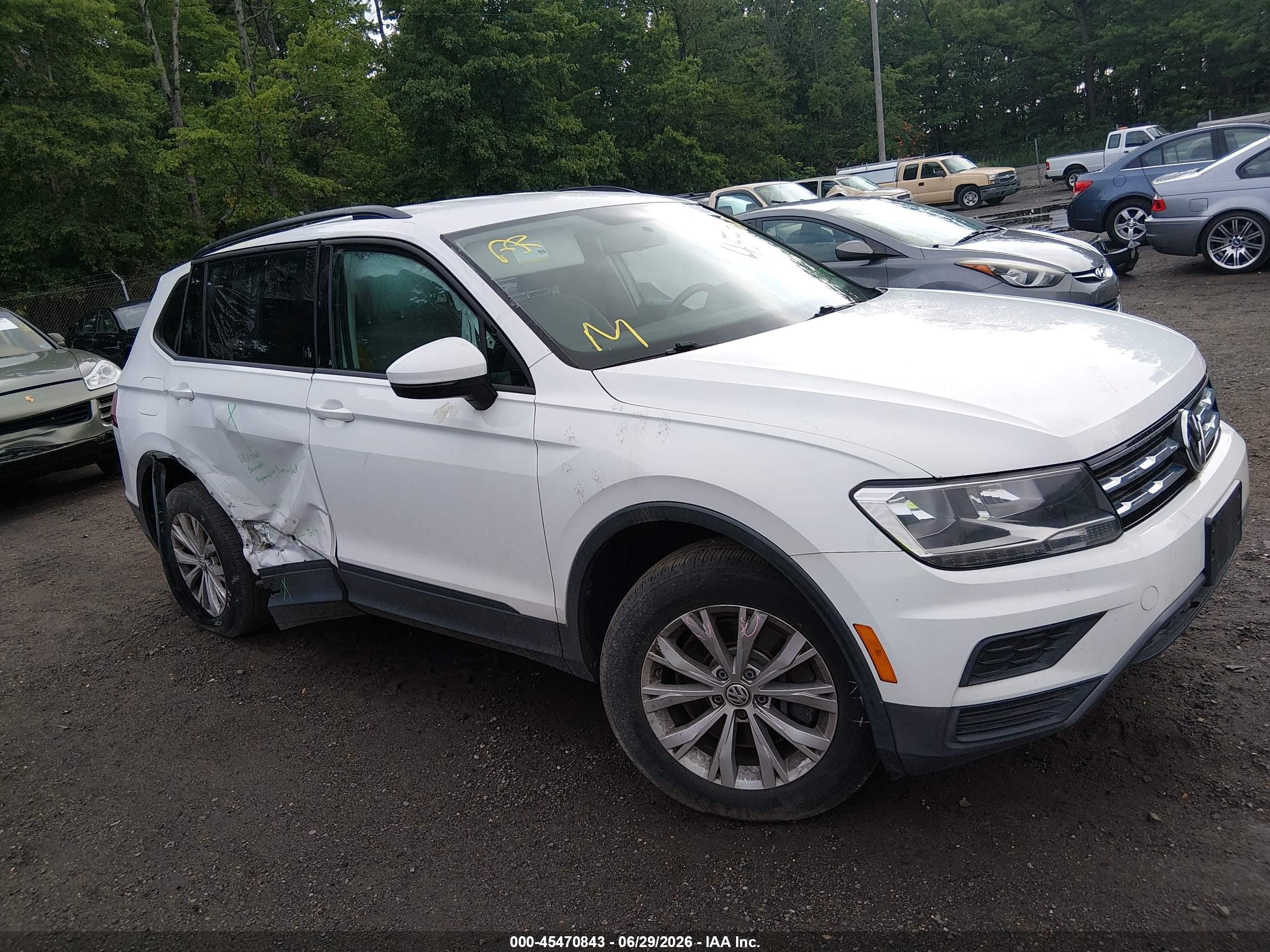 2018 Volkswagen Tiguan S, VIN 3VV0B7AX0JM098509 — Side