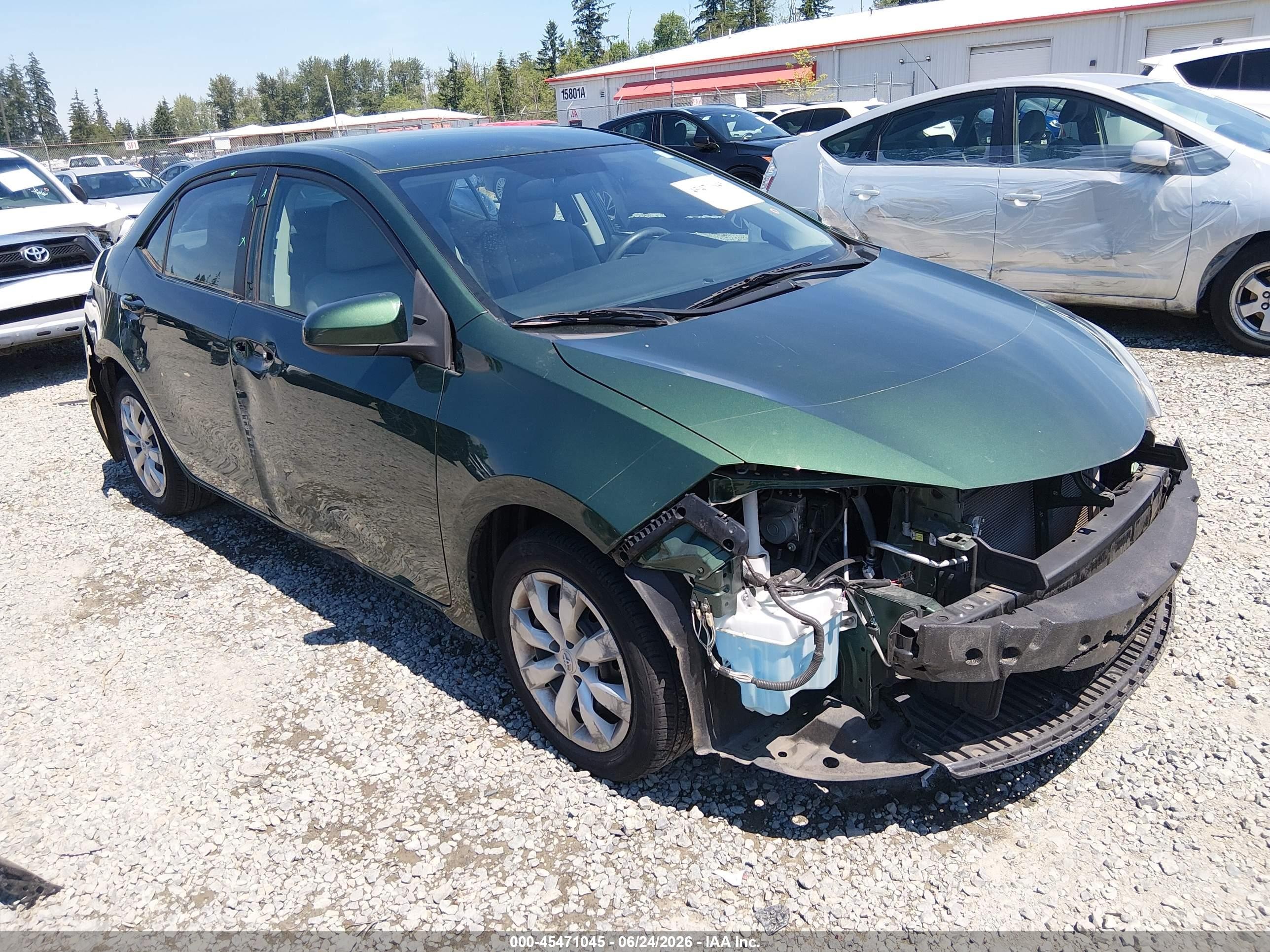 2014 Toyota Corolla LE, VIN 2T1BURHE5EC099381 — Side