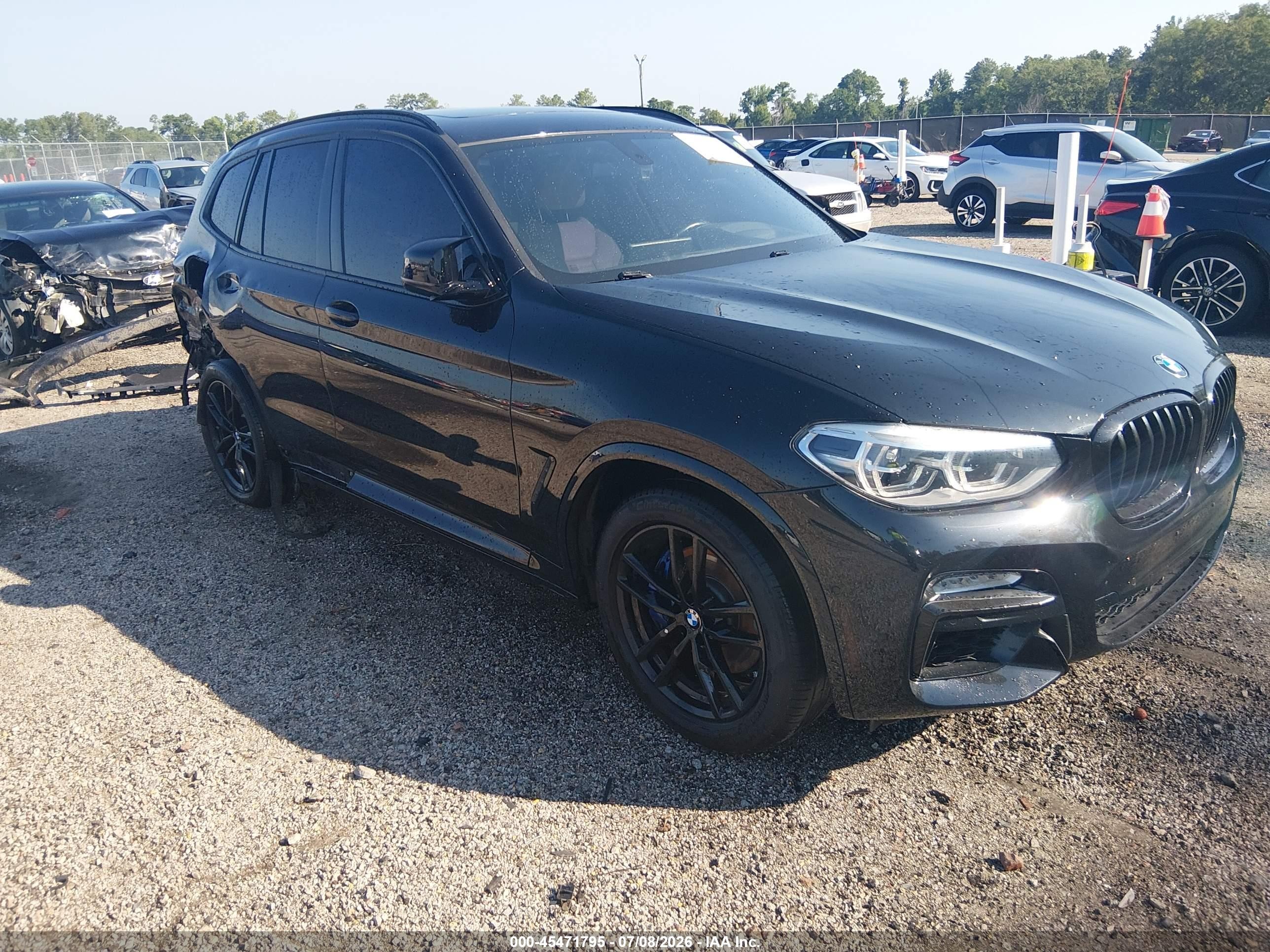 2018 BMW X3 M40i, VIN 5UXTS3C58J0Y98119 — Зад