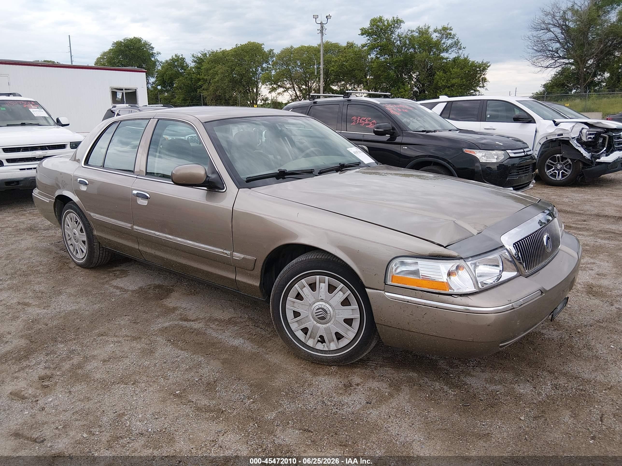 2004 Mercury Grand Marquis GS, VIN 2MEFM74W74X684153 — Side