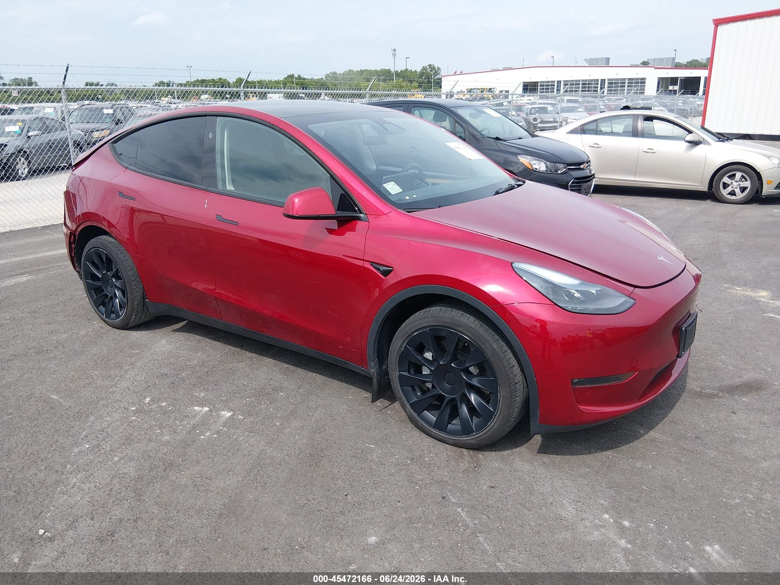 2024 Tesla Model Y Long Range, VIN 7SAYGDEE1RA222507 — Rear end