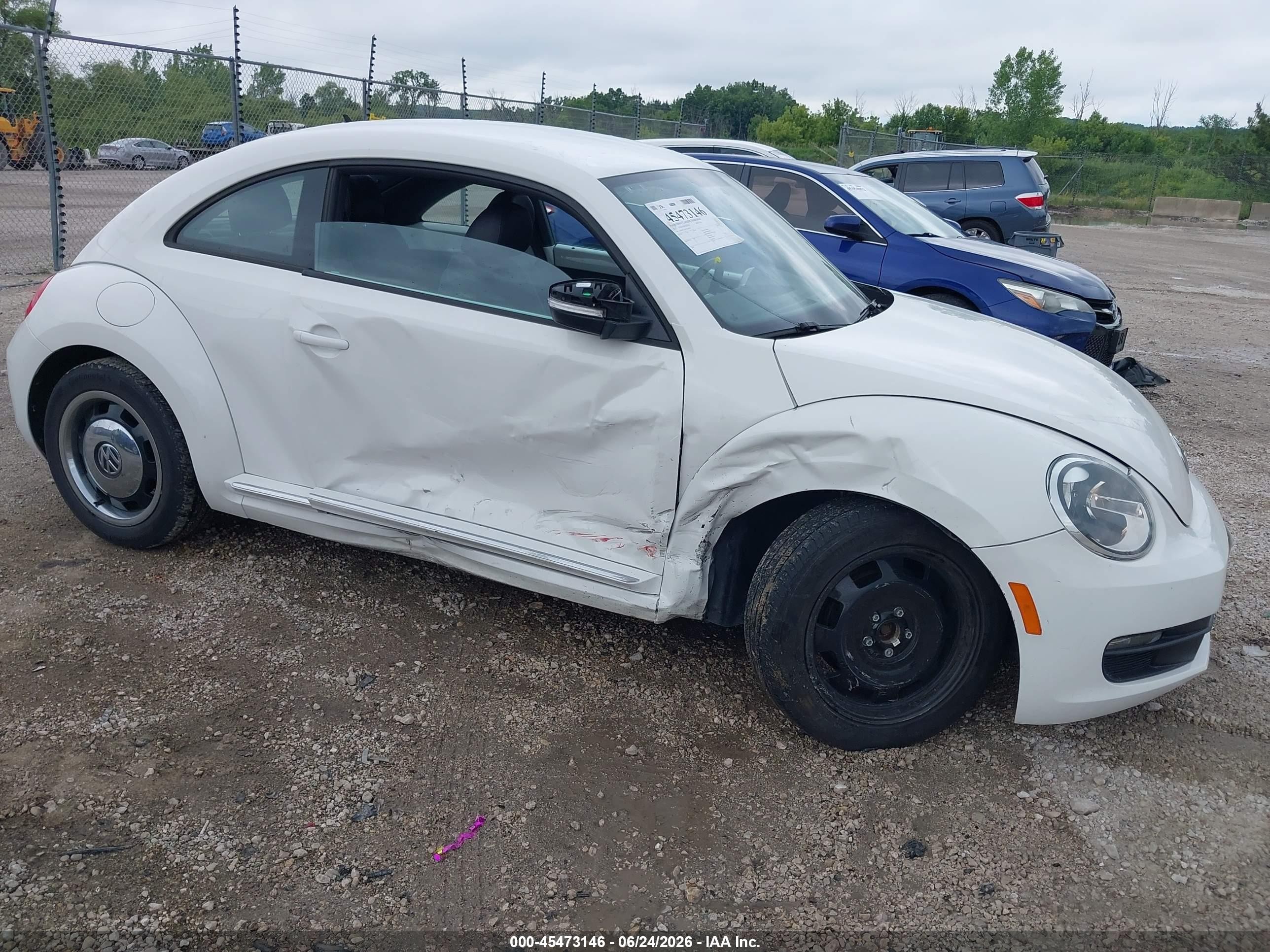2012 Volkswagen Beetle 2.5L PZEV, VIN 3VWJP7AT6CM645767 — Side
