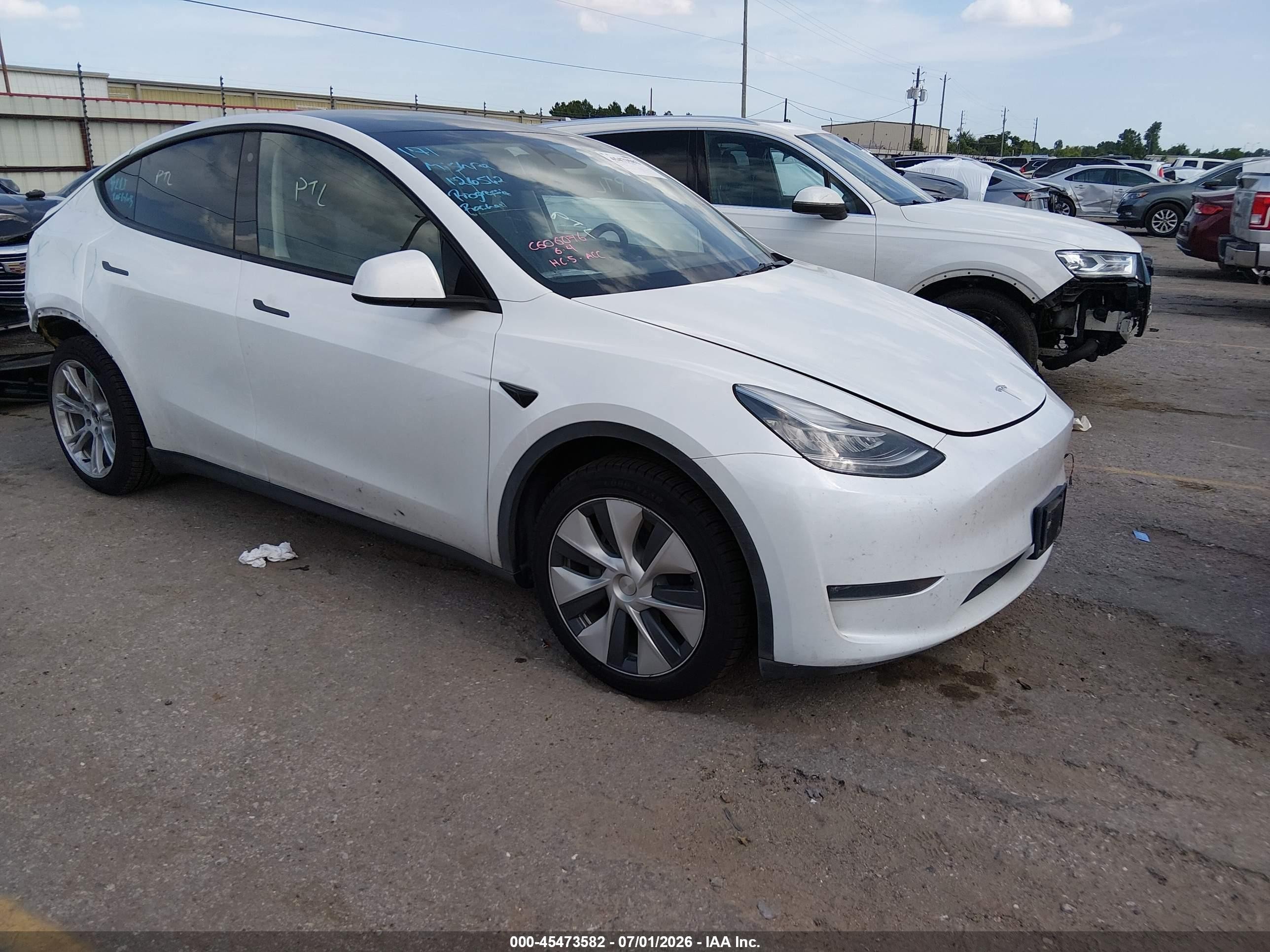 2023 Tesla Model Y Long Range, VIN 7SAYGDEE4PA126562 — Rear end