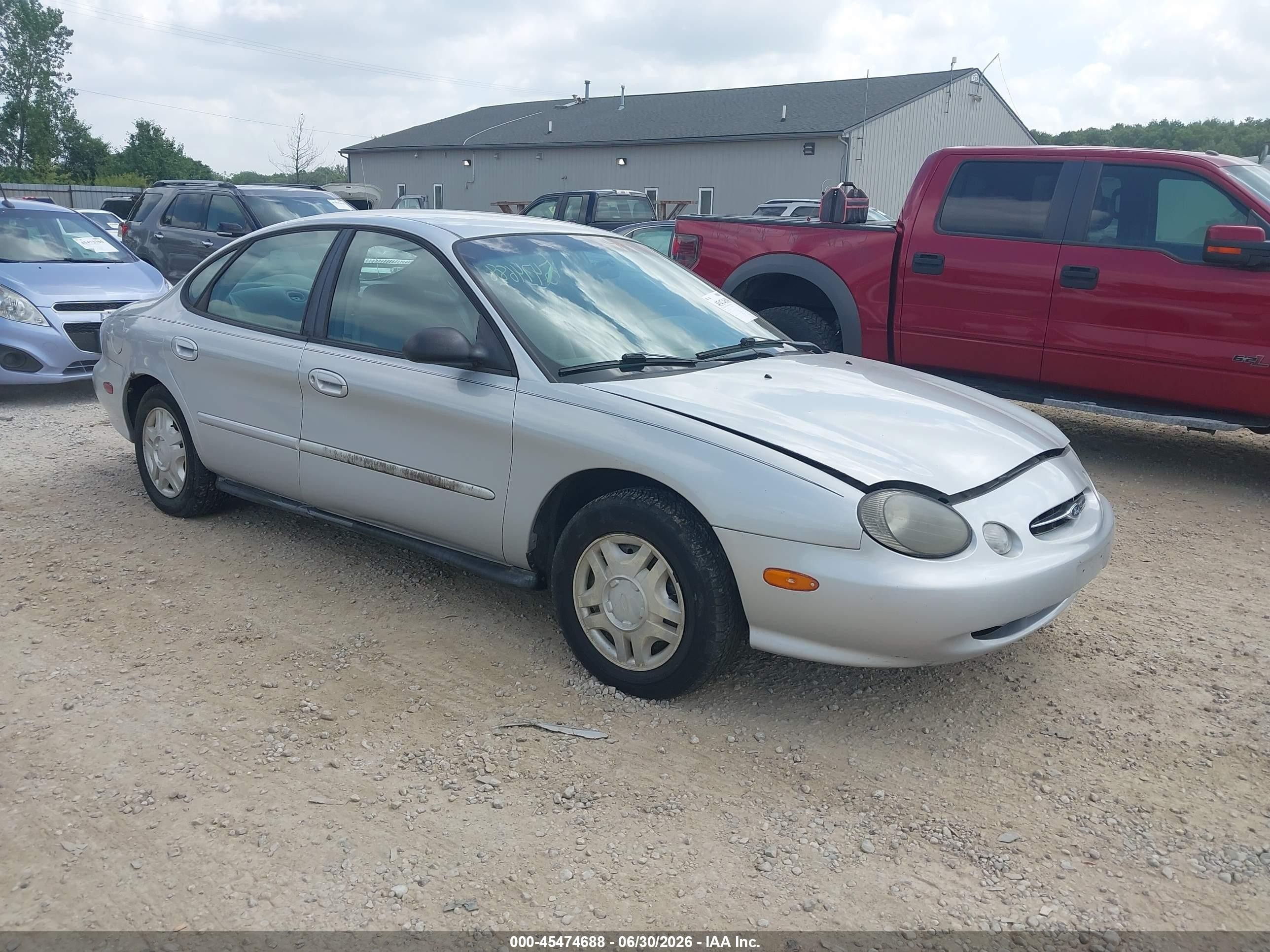 1999 Ford Taurus LX, VIN 1FAFP52U4XG153457 — Normal wear