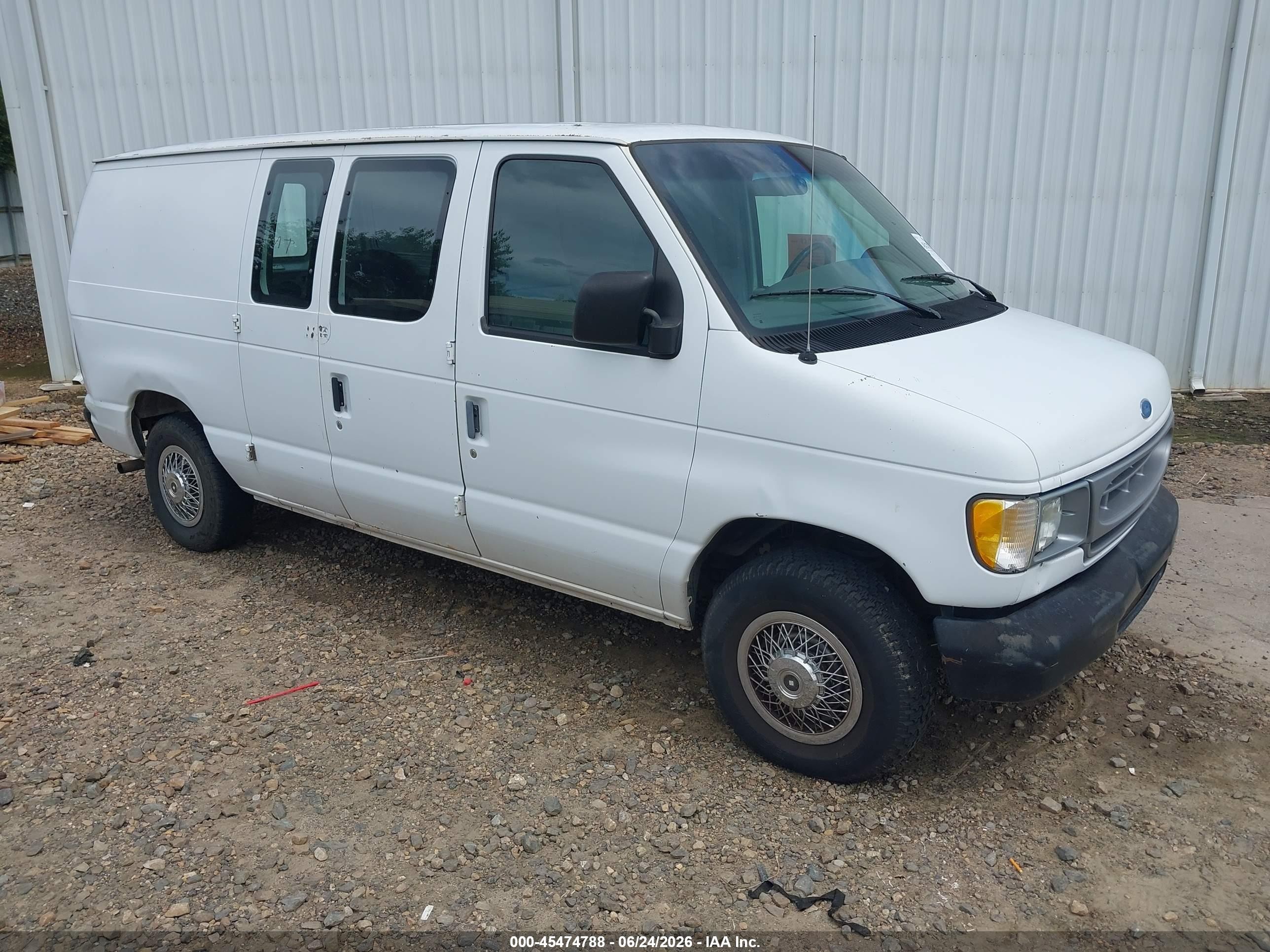 1997 Ford E-150, VIN 1FTEE1426VHB47943 — Normal wear