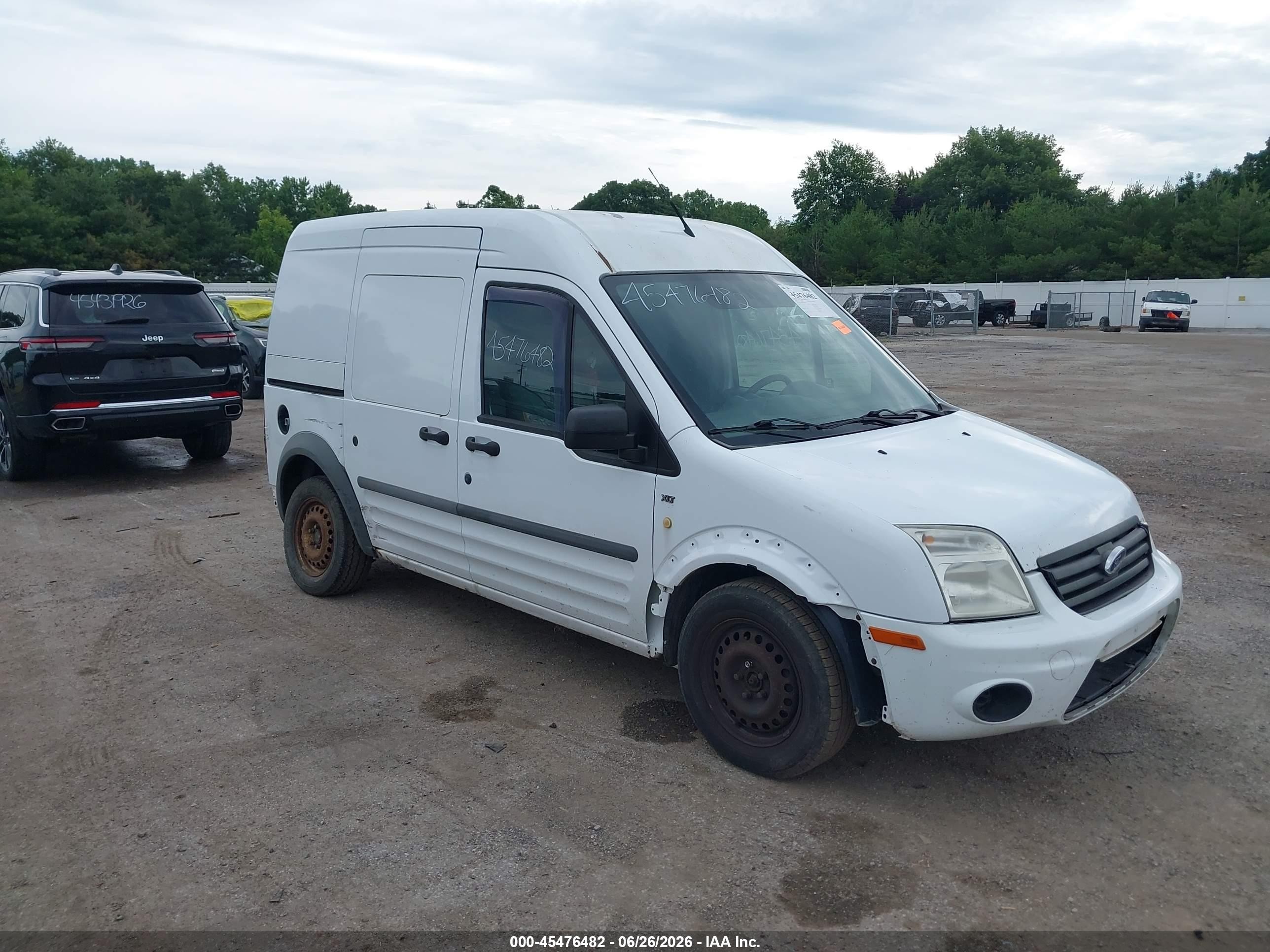 2010 Ford Transit Connect XLT, VIN NM0LS7BN0AT040343 — Side