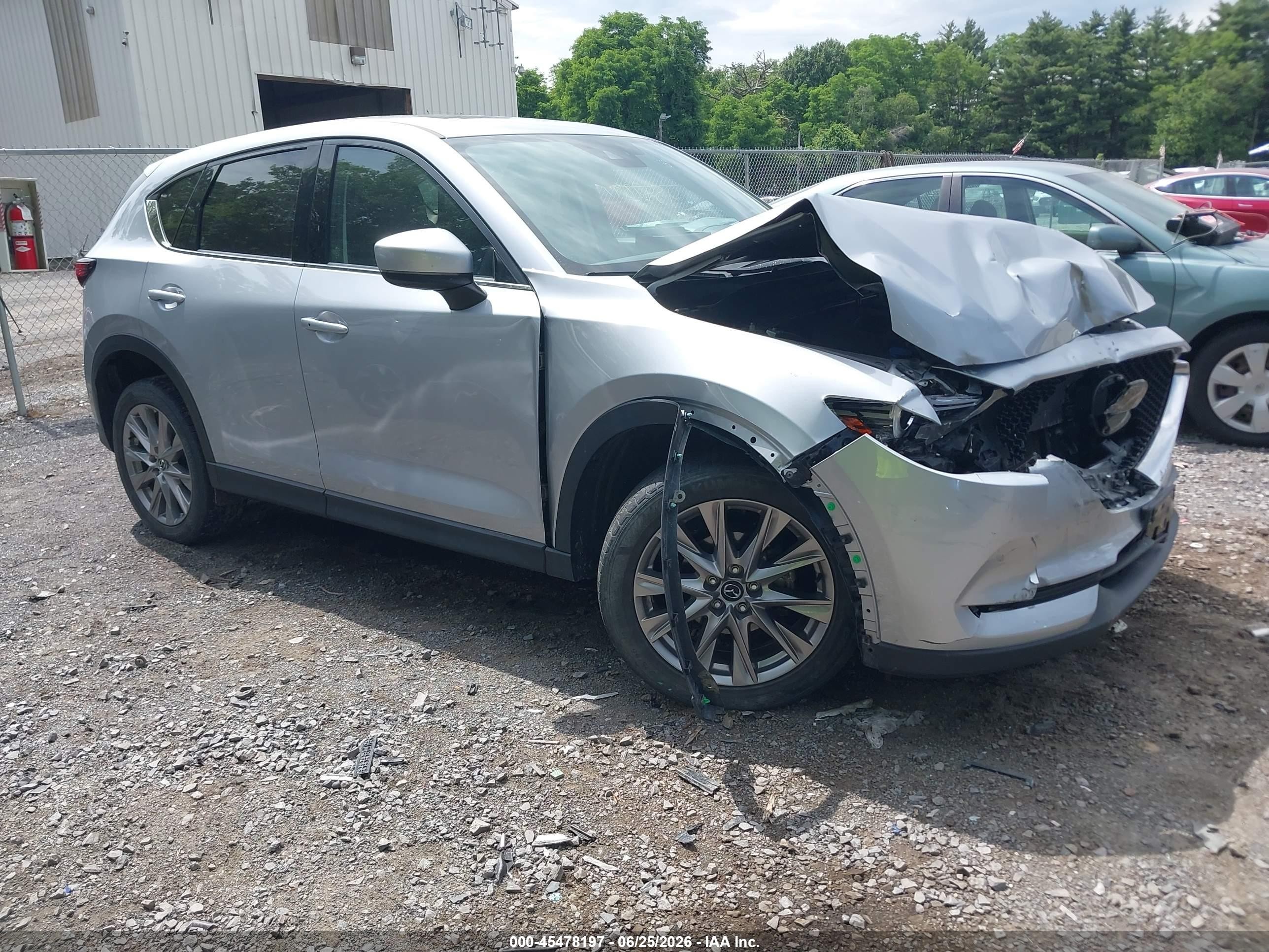 2021 Mazda CX-5 Grand Touring, VIN JM3KFBDM3M1367644 — Front end