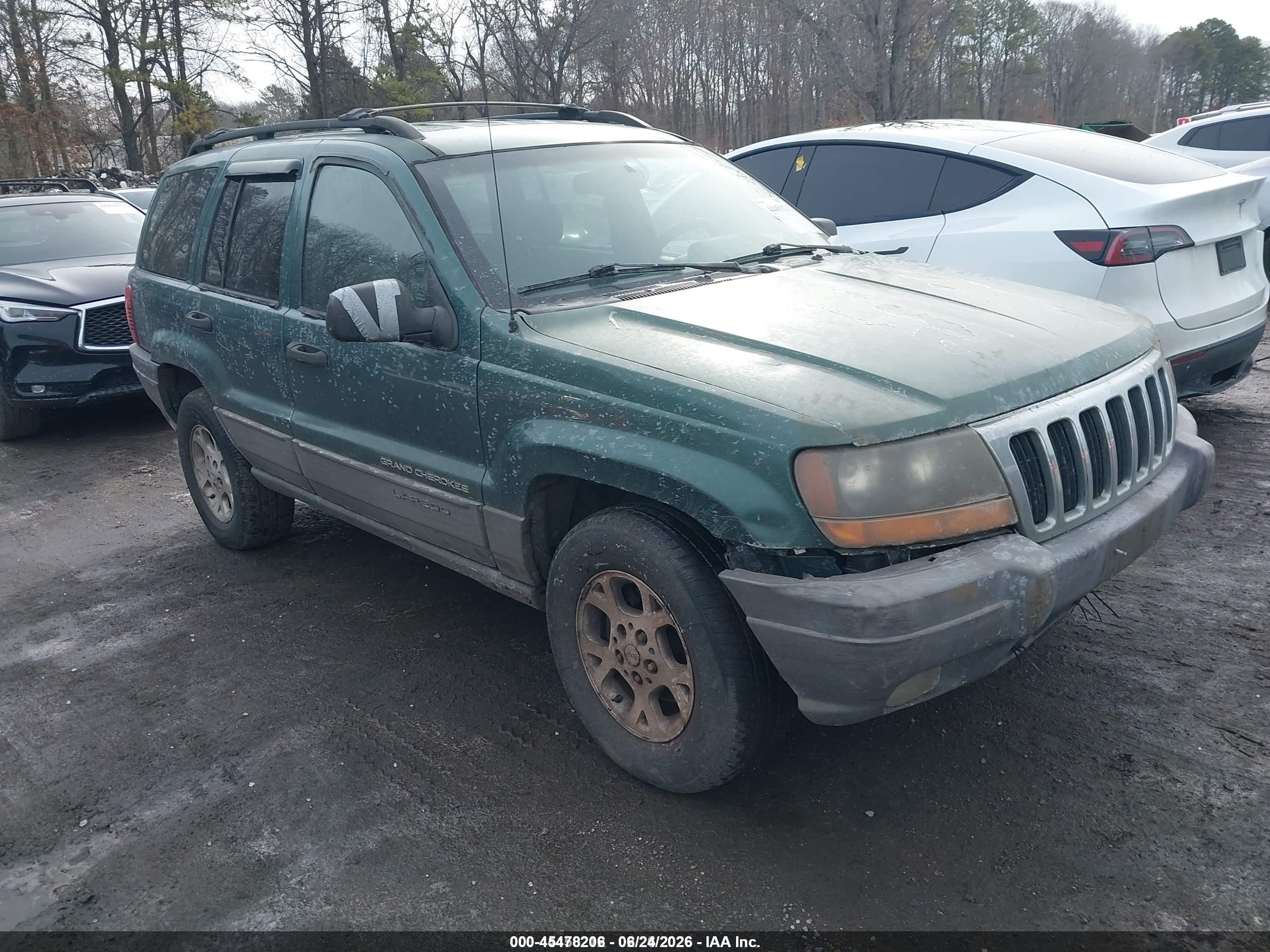 1999 Jeep Grand Cherokee Laredo, VIN 1J4GW58N2XC706979 — Not stated