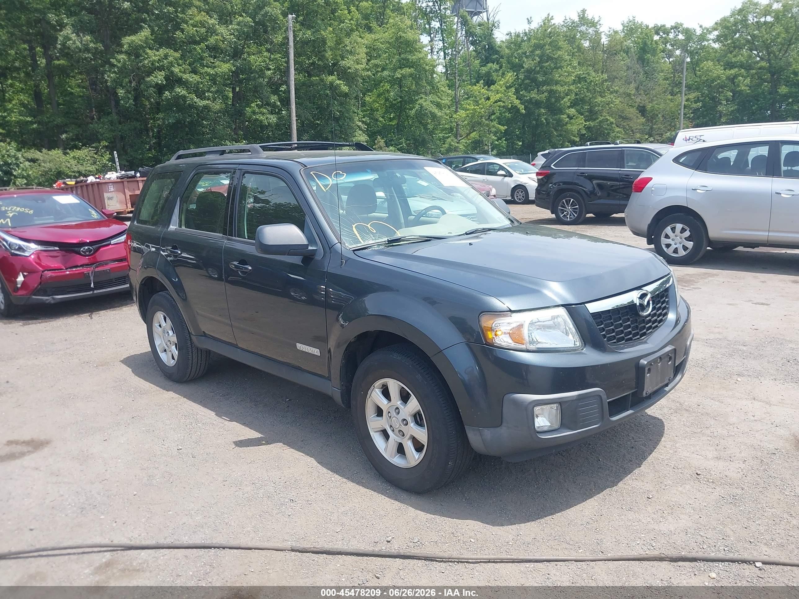 2008 Mazda Tribute Grand Touring, VIN 4F2CZ02Z98KM23478 — Side