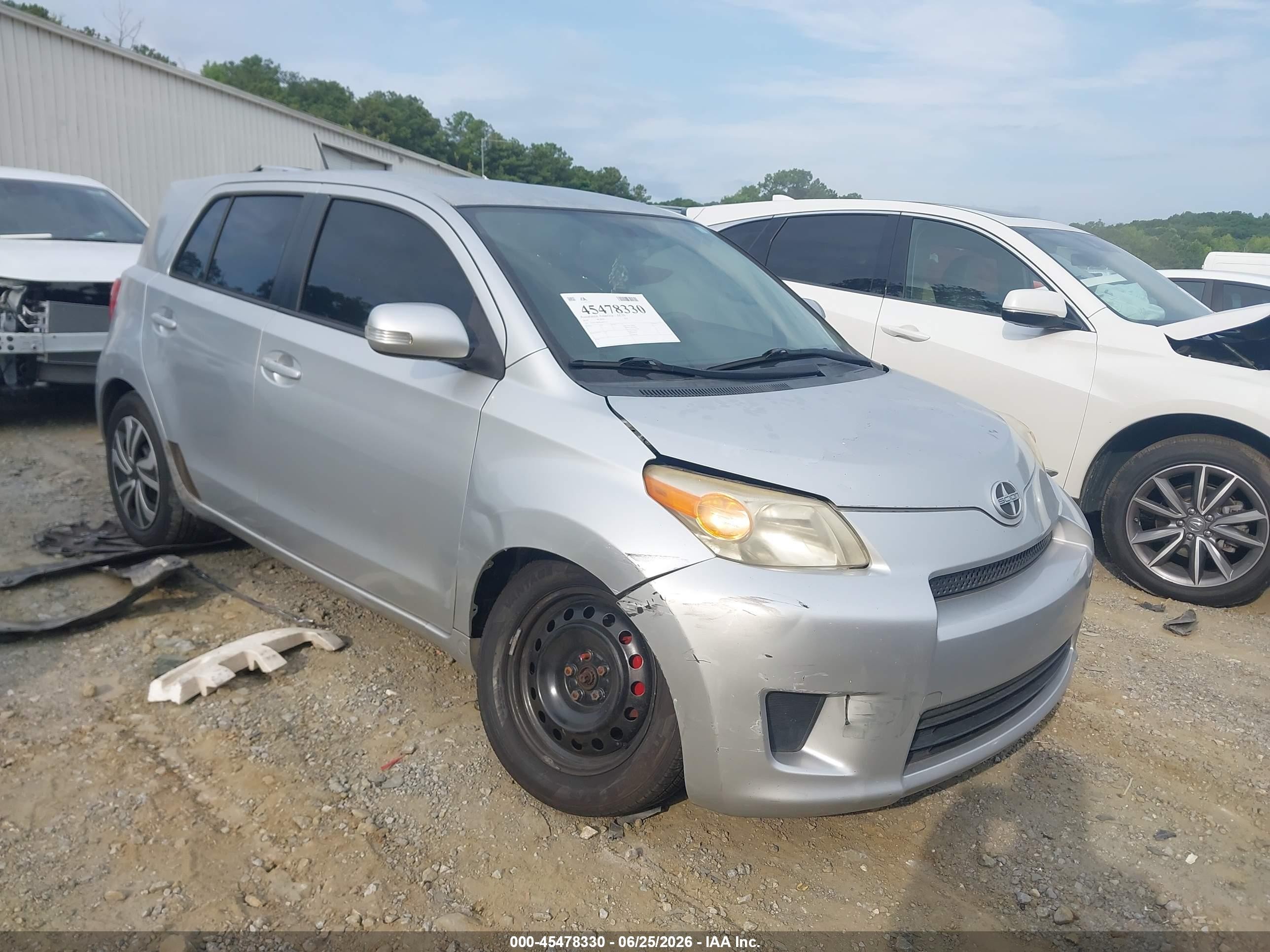 2010 Scion xD, VIN JTKKU4B48AJ054543 — Side