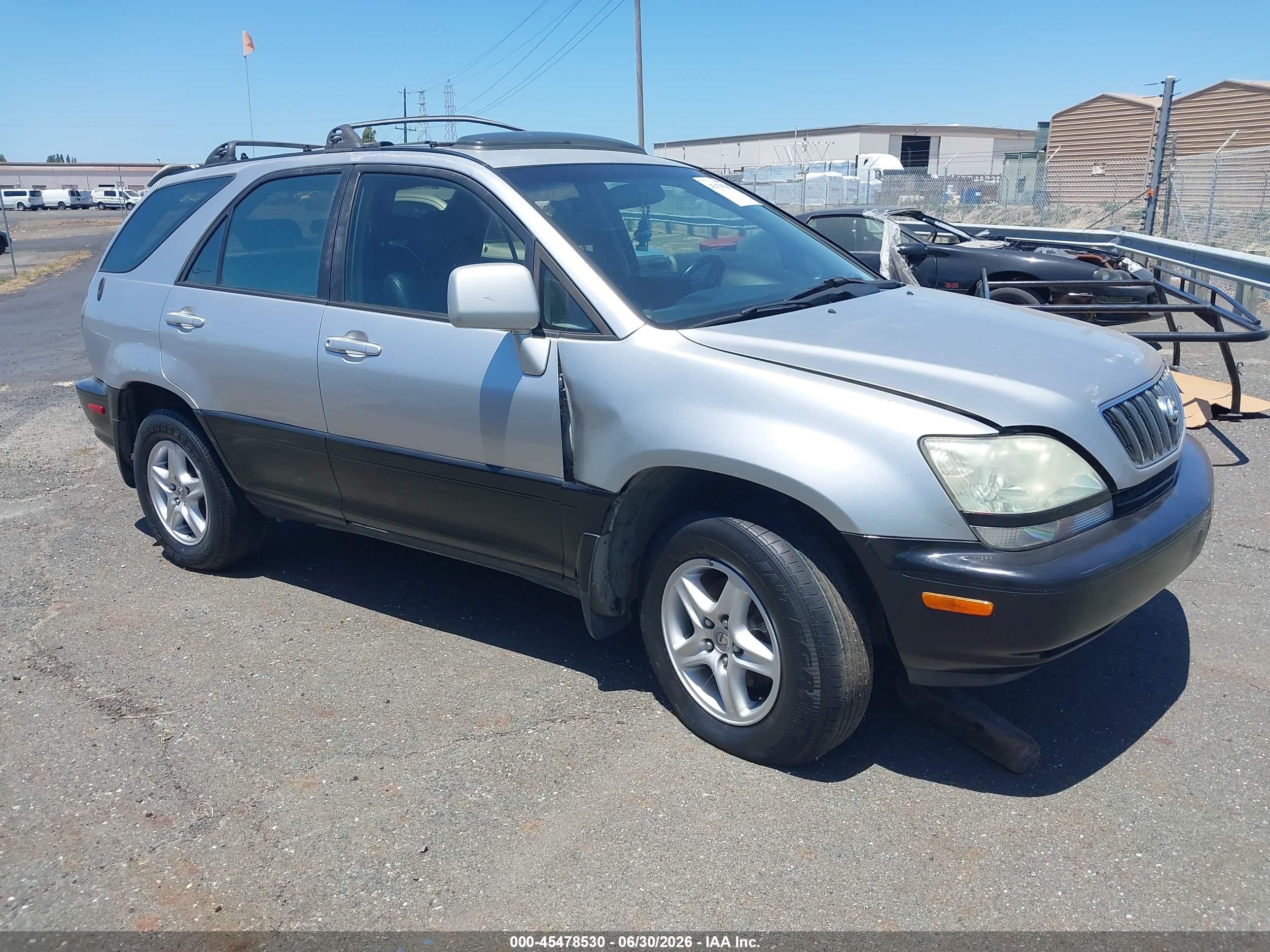 1999 Lexus RX 300, VIN JT6HF10U4X0042215 — Бок