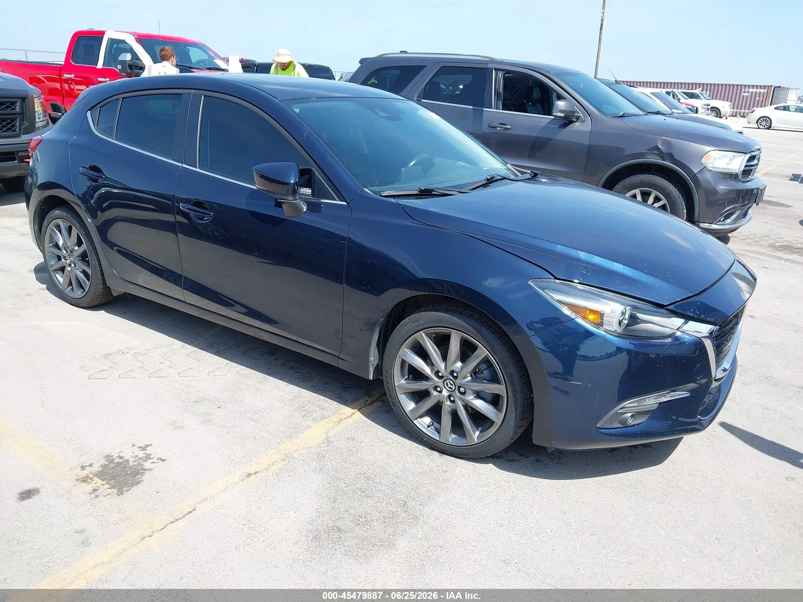 2018 Mazda 3 Grand Touring, VIN 3MZBN1M35JM203014 — Water / flood