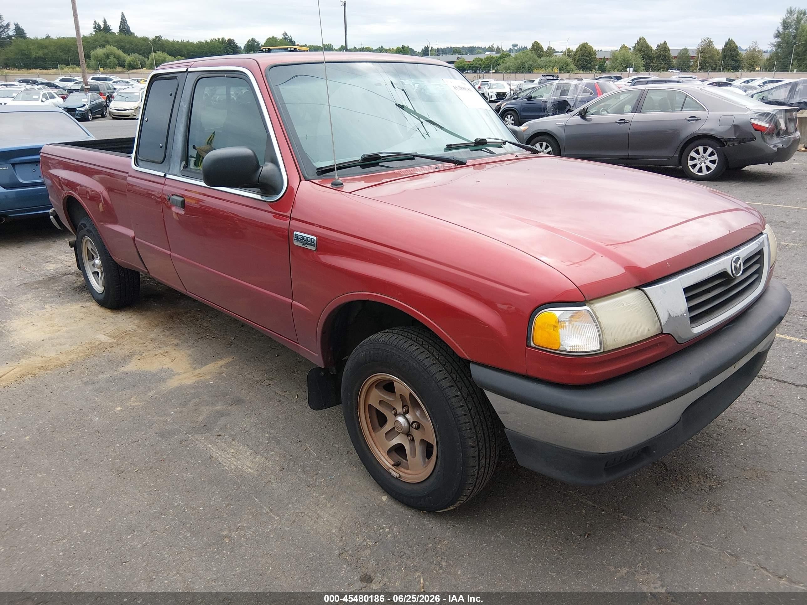 2000 Mazda B-Series SE, VIN 4F4YR16V1YTM15623 — Normal wear