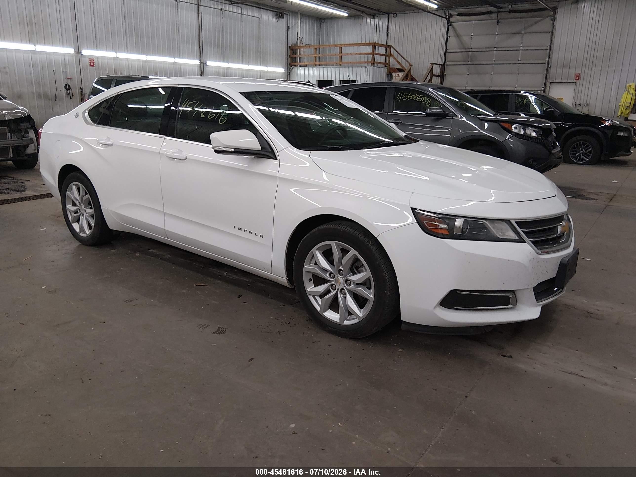 2016 Chevrolet Impala LT, VIN 1G1115S31GU162270 — Град