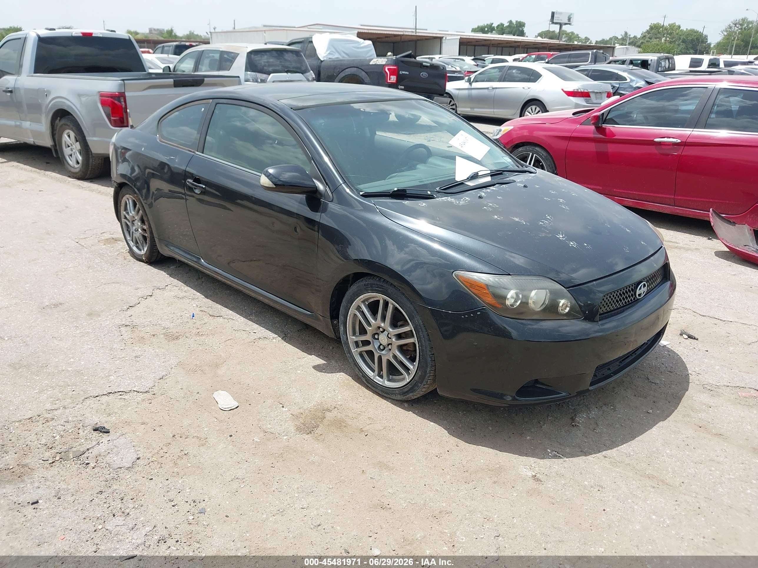 2009 Scion tC, VIN JTKDE167490296028 — Зад