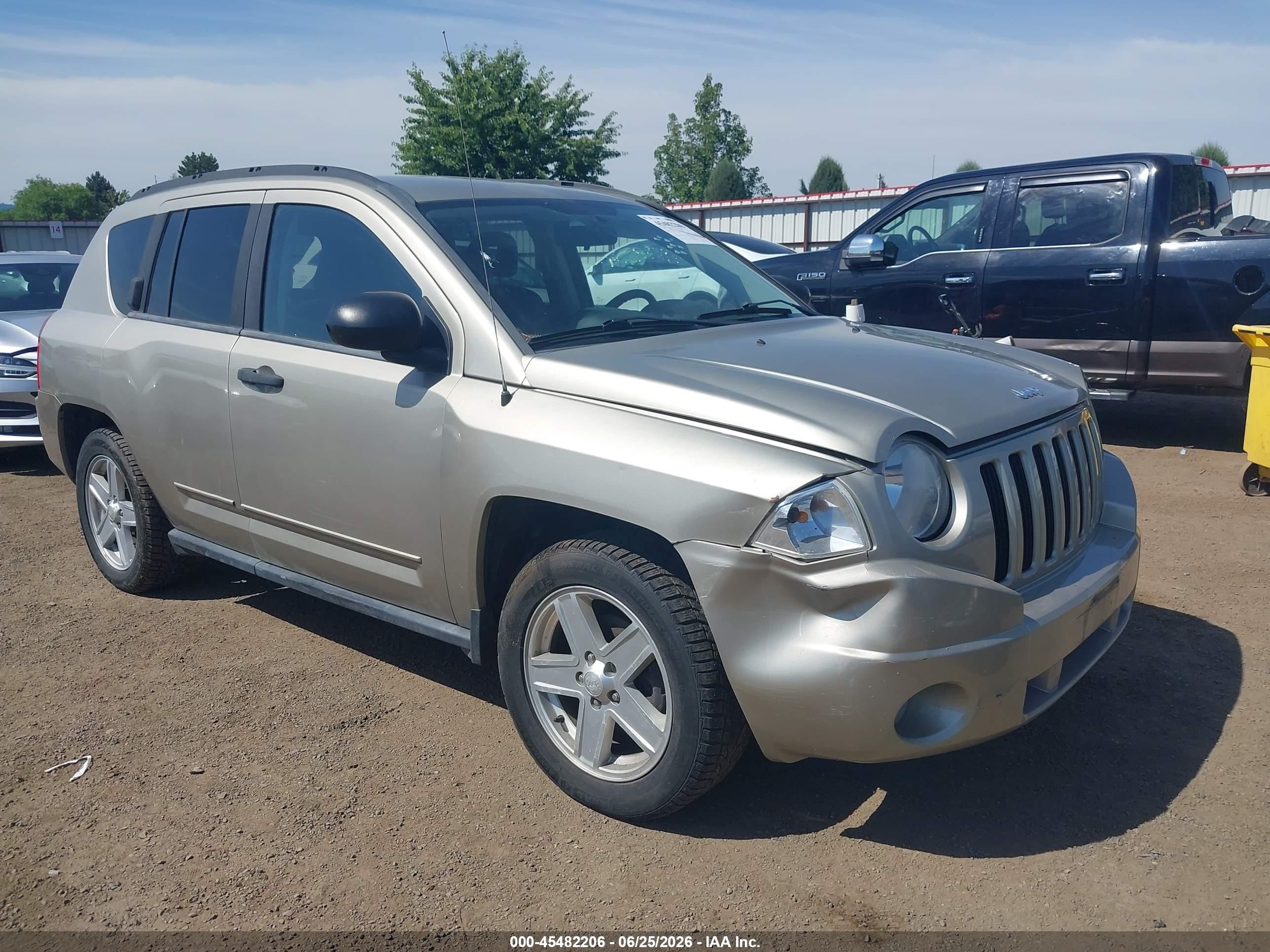 2009 Jeep Compass Sport, VIN 1J4FF47B19D205995 — Side