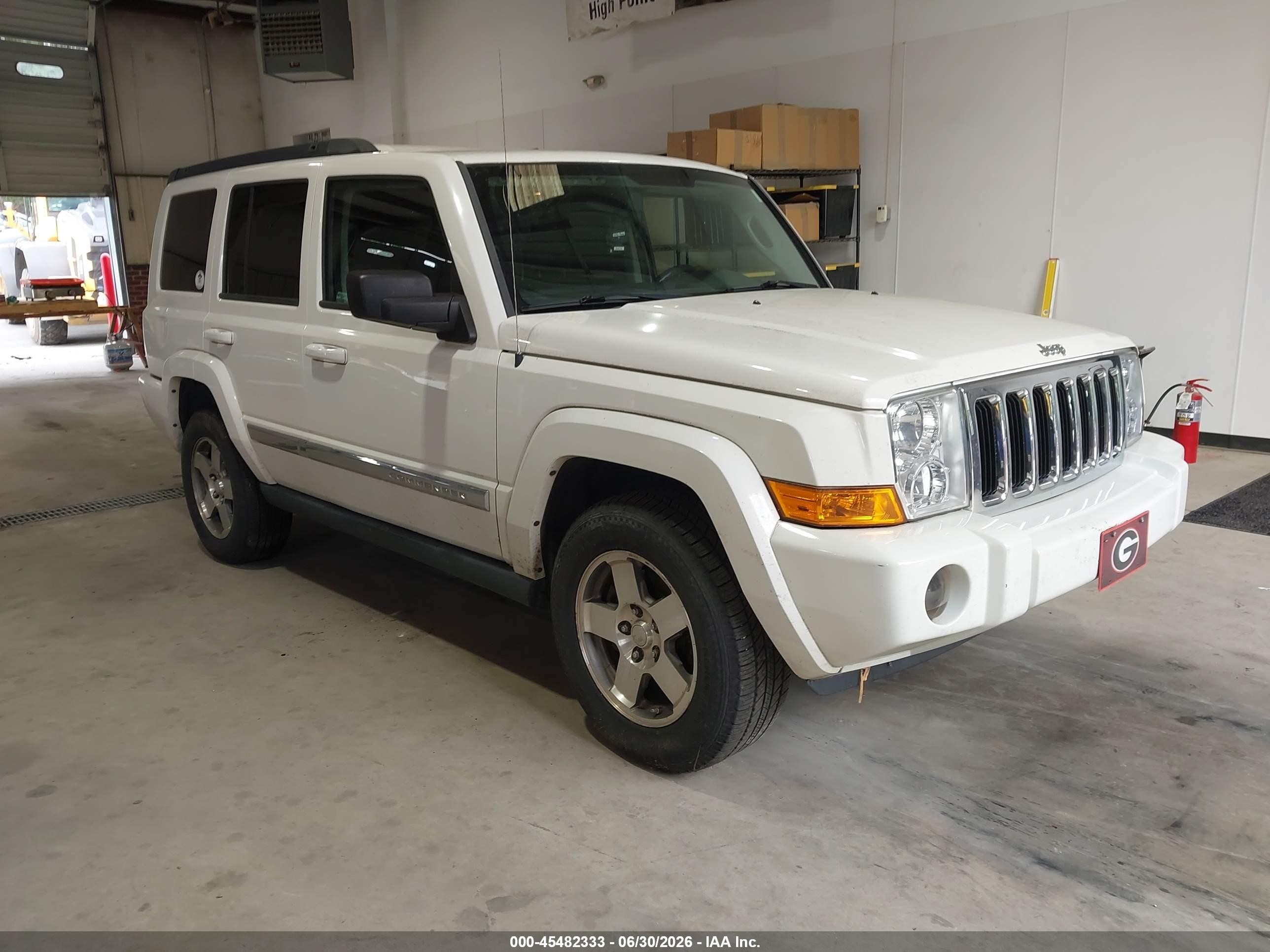 2010 Jeep Commander Sport, VIN 1J4RH4GK4AC140903 — Rear end