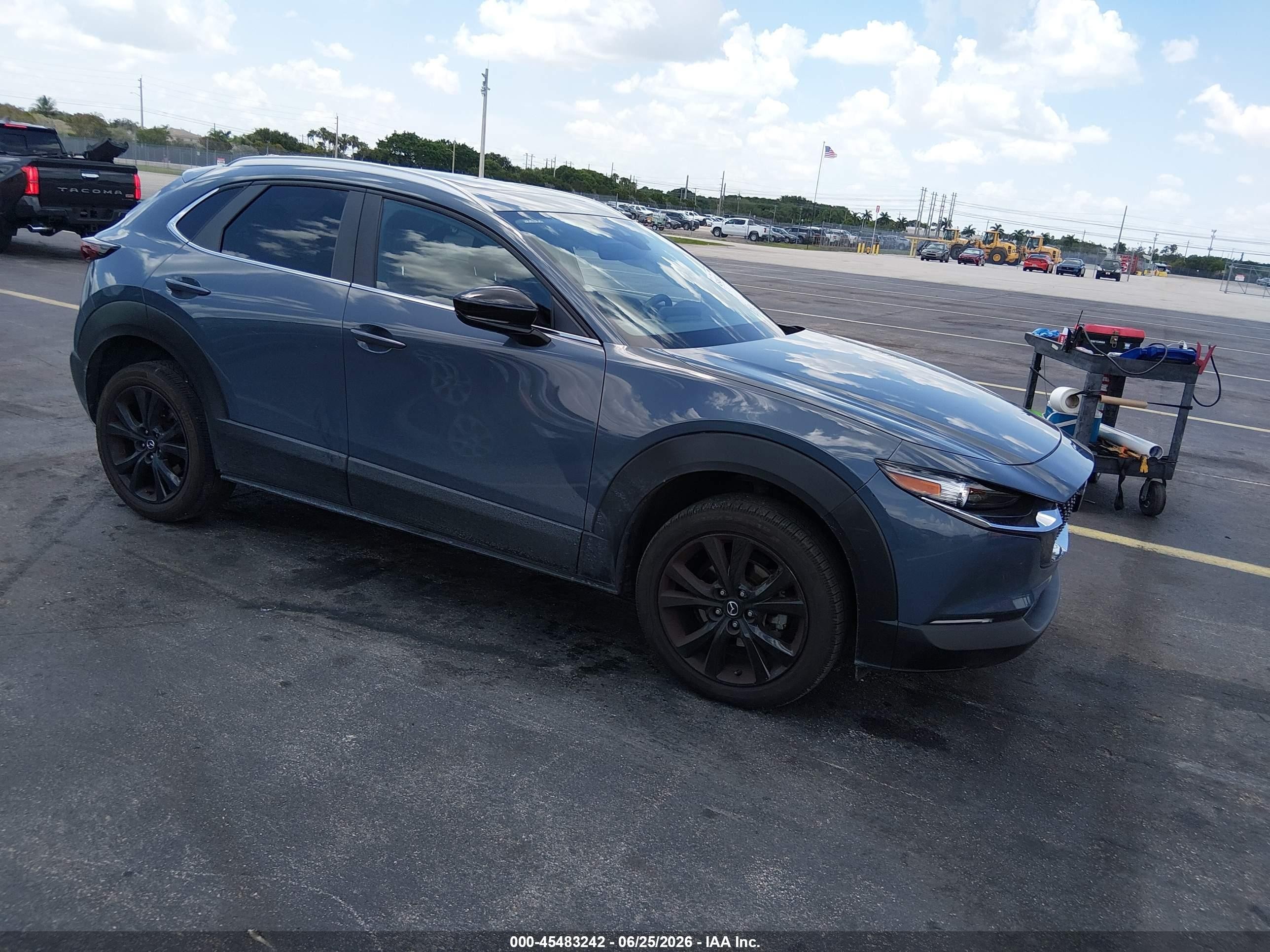 2022 Mazda CX-30 S Carbon Edition, VIN 3MVDMBCL3NM445570 — Side