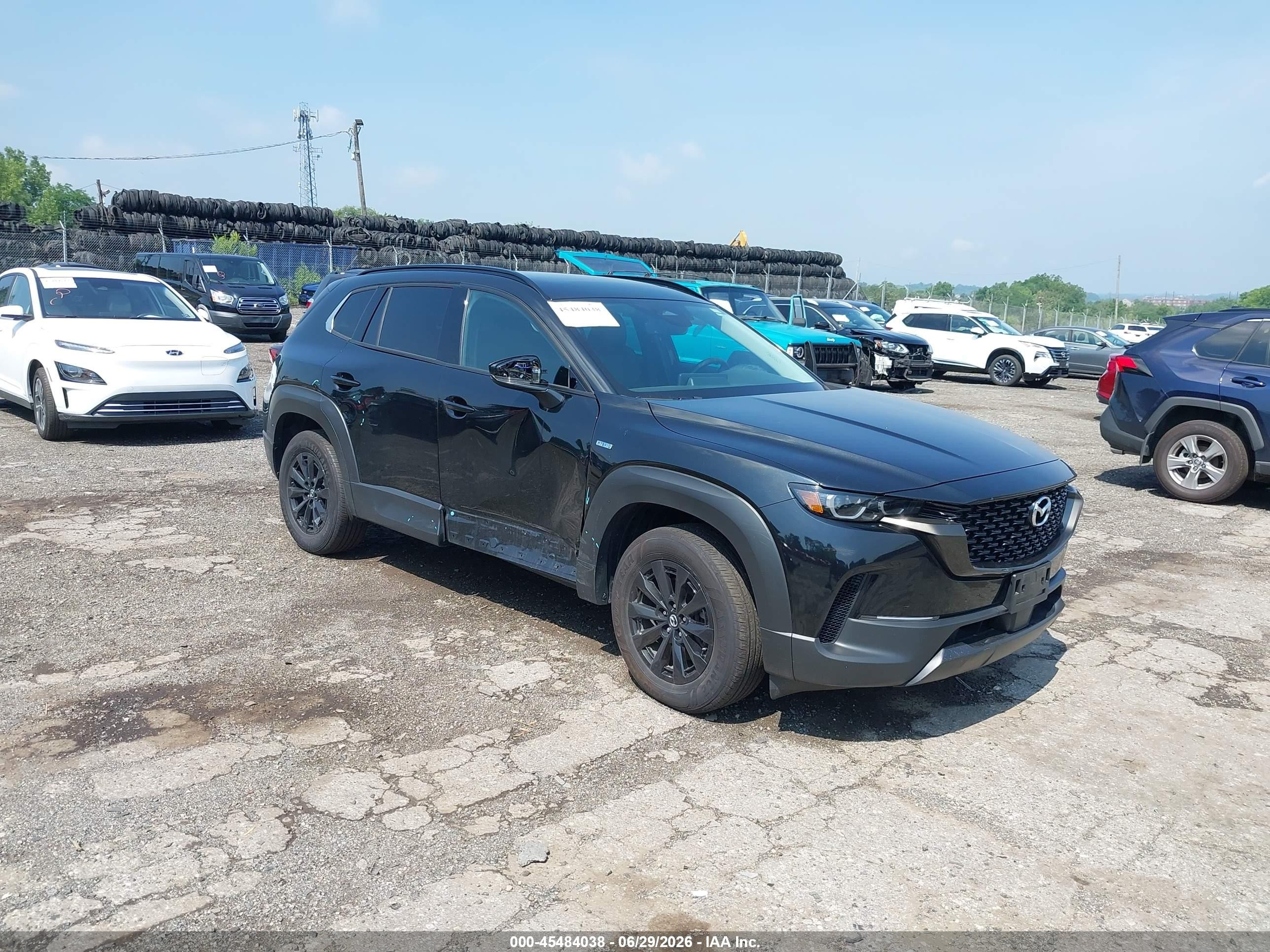 2025 Mazda CX-50 Hybrid Premium Package, VIN 7MMVAADW6SN131334 — Side