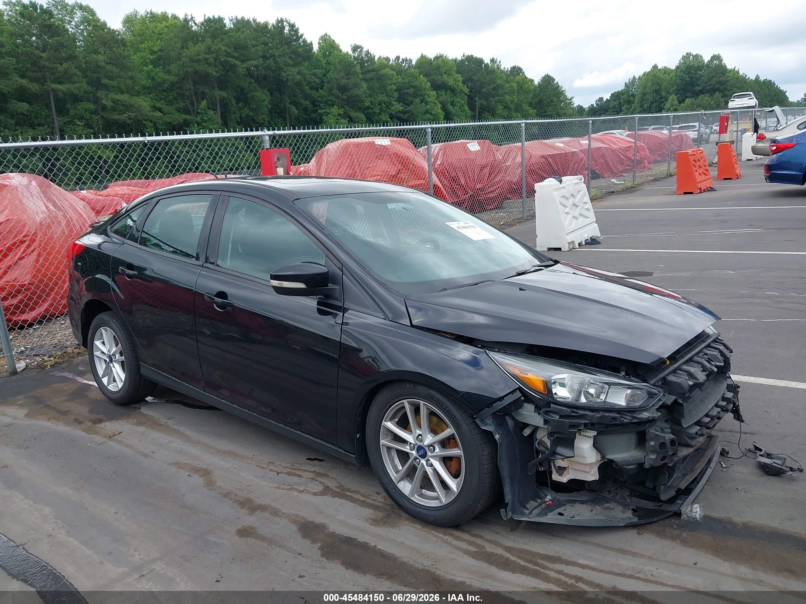 2016 Ford Focus SE, VIN 1FADP3F2XGL338723 — Undercarriage