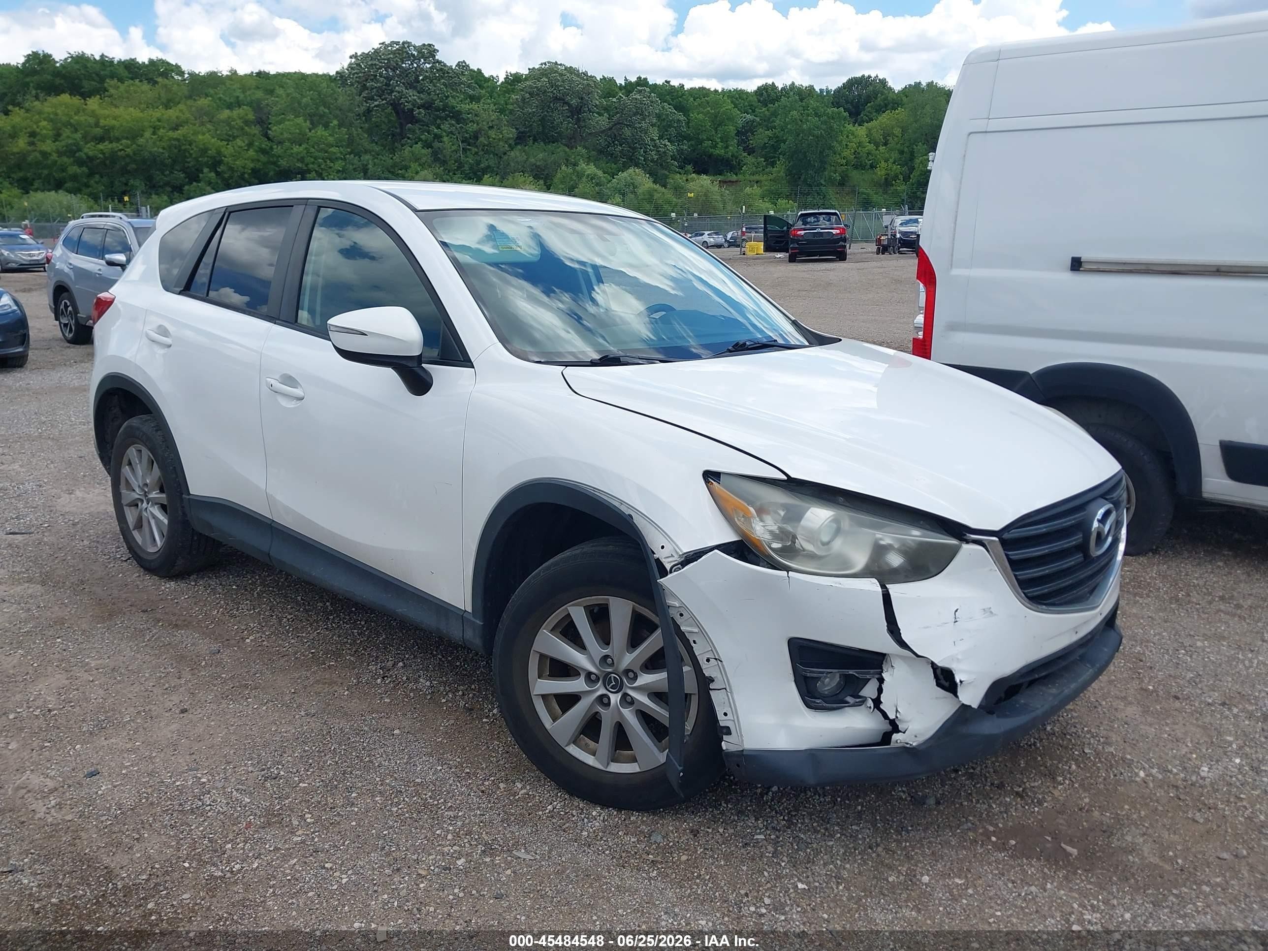 2016 Mazda CX-5 Touring, VIN JM3KE4CY9G0688536 — Front end