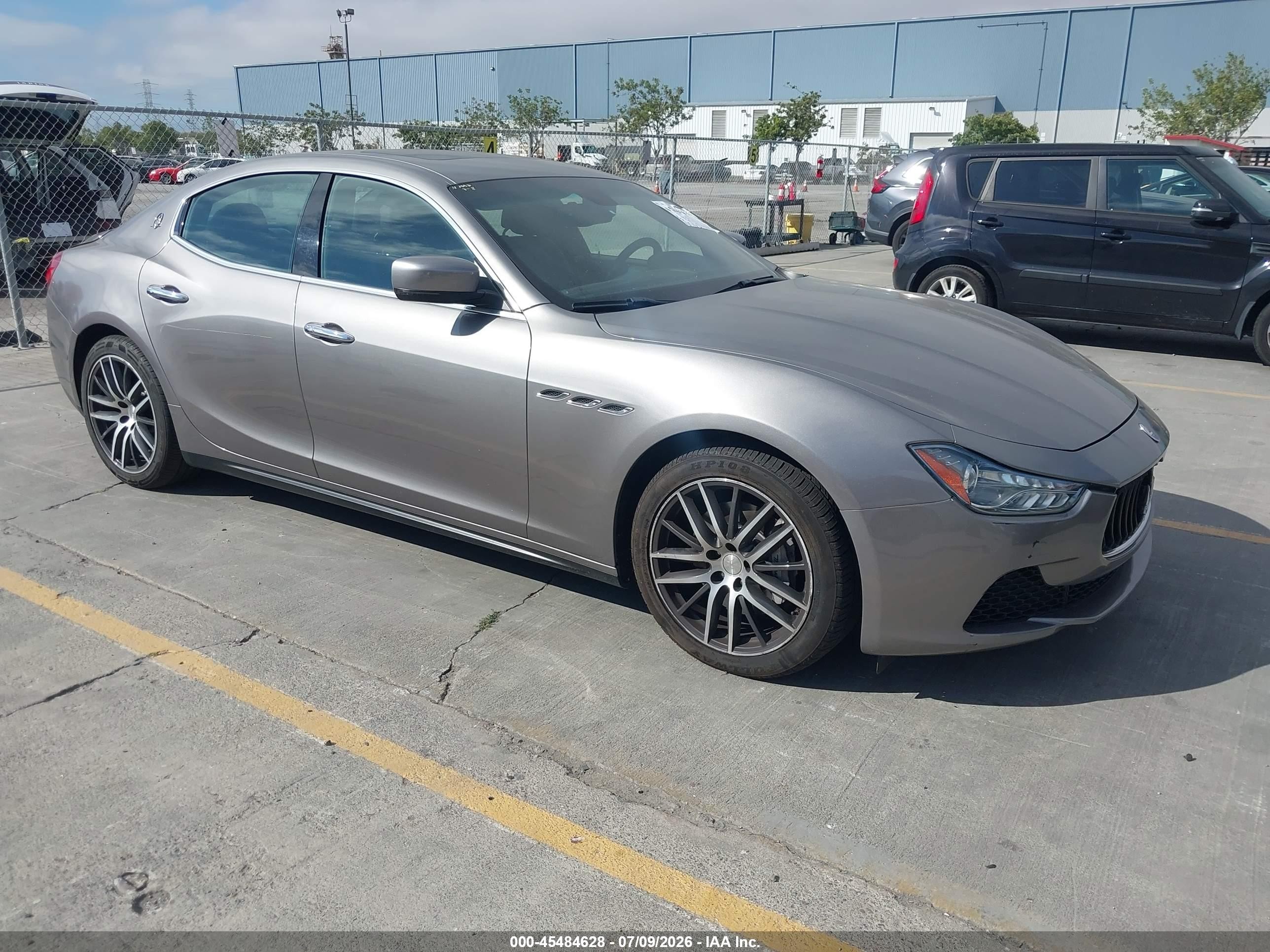 2016 Maserati Ghibli, VIN ZAM57XSA4G1167039 — Зад