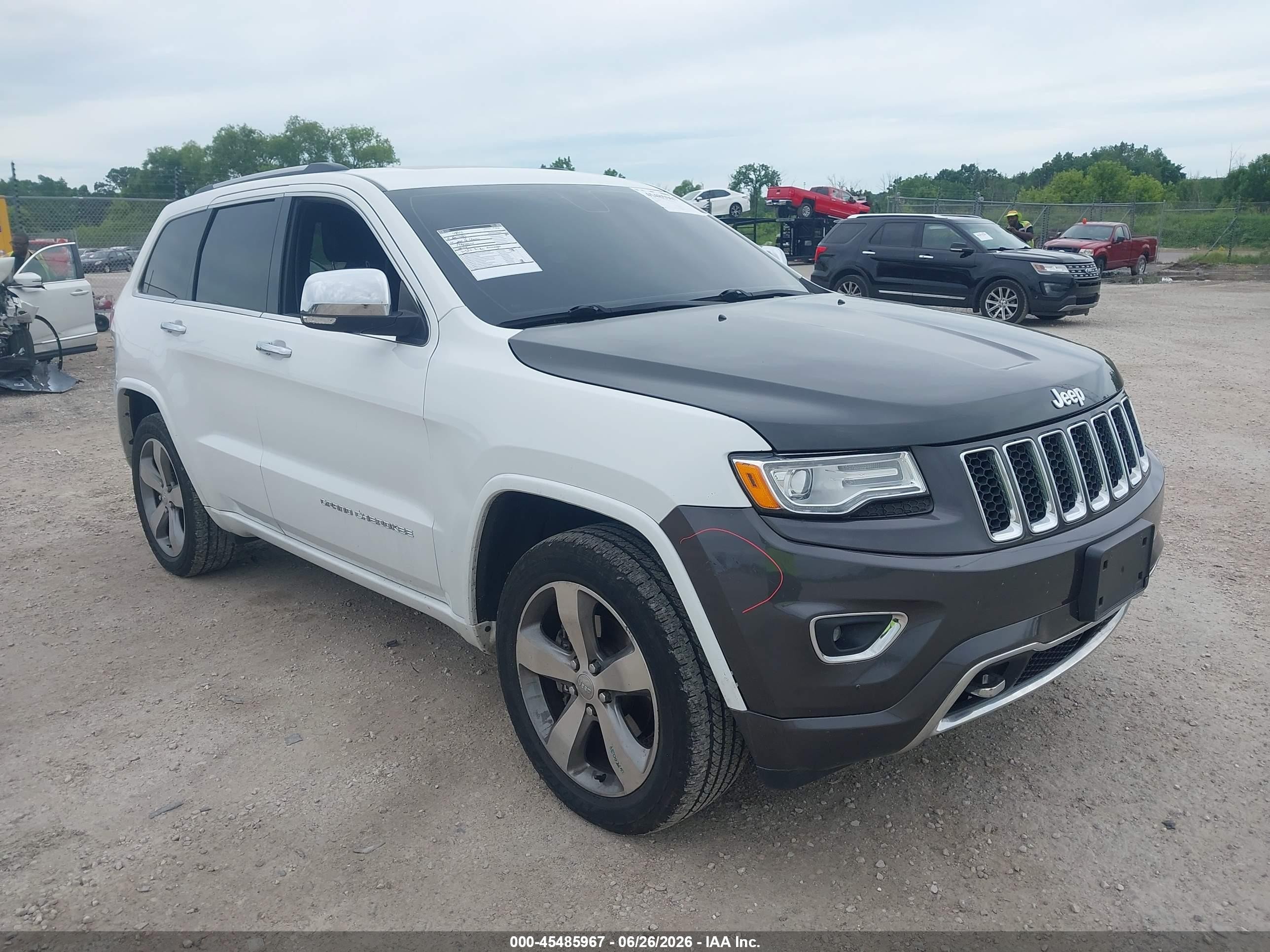 2014 Jeep Grand Cherokee Overland, VIN 1C4RJFCG6EC178890 — Side