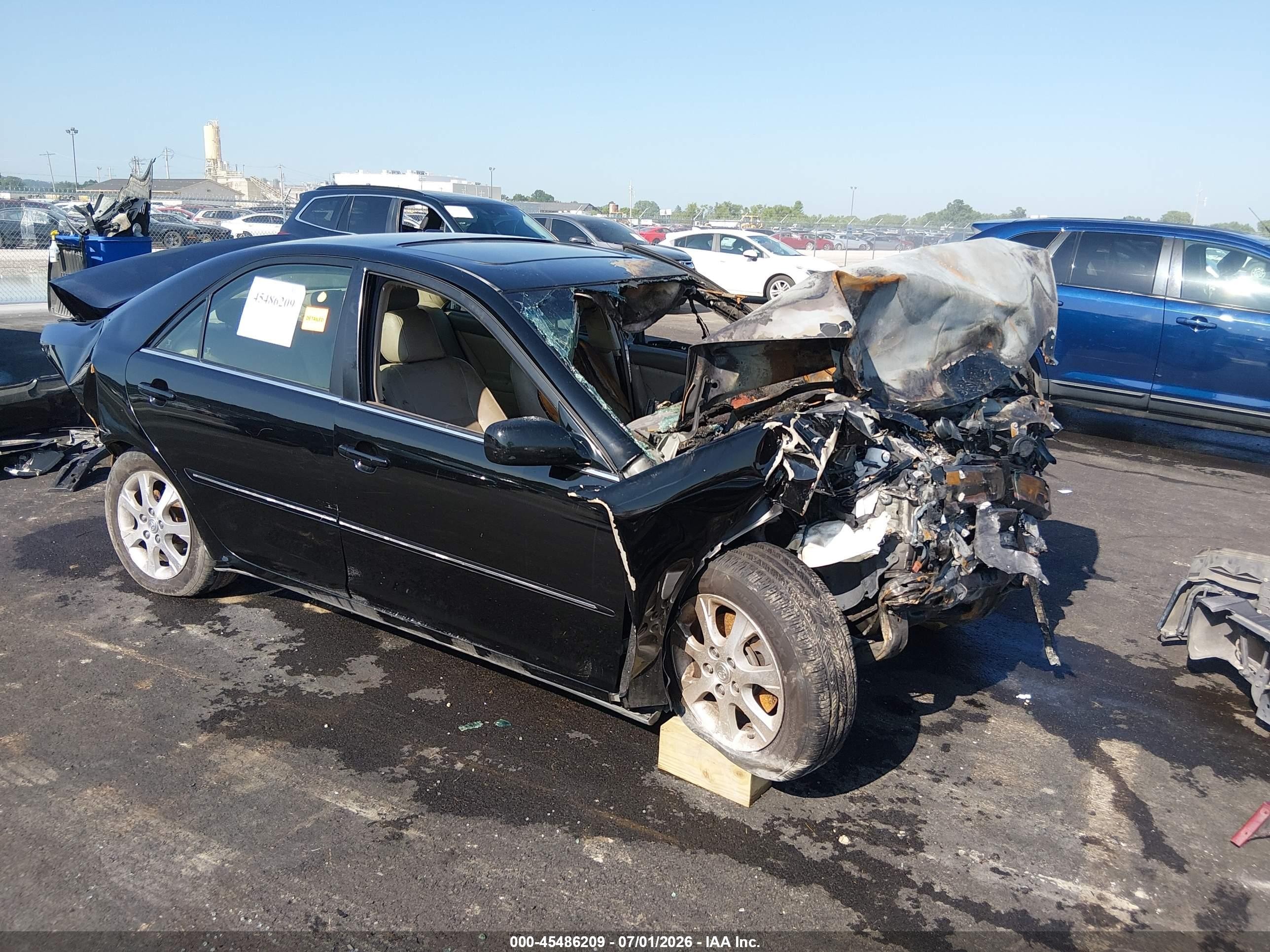 2005 Toyota Camry XLE, VIN 4T1BF32K45U104929 — Engine fire