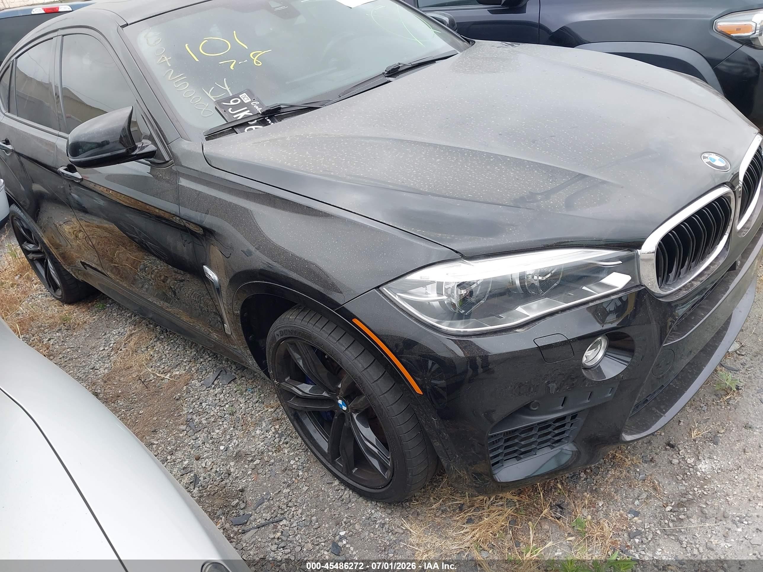 2018 BMW X6 M, VIN 5YMKW8C58J0U72565 — Rear end