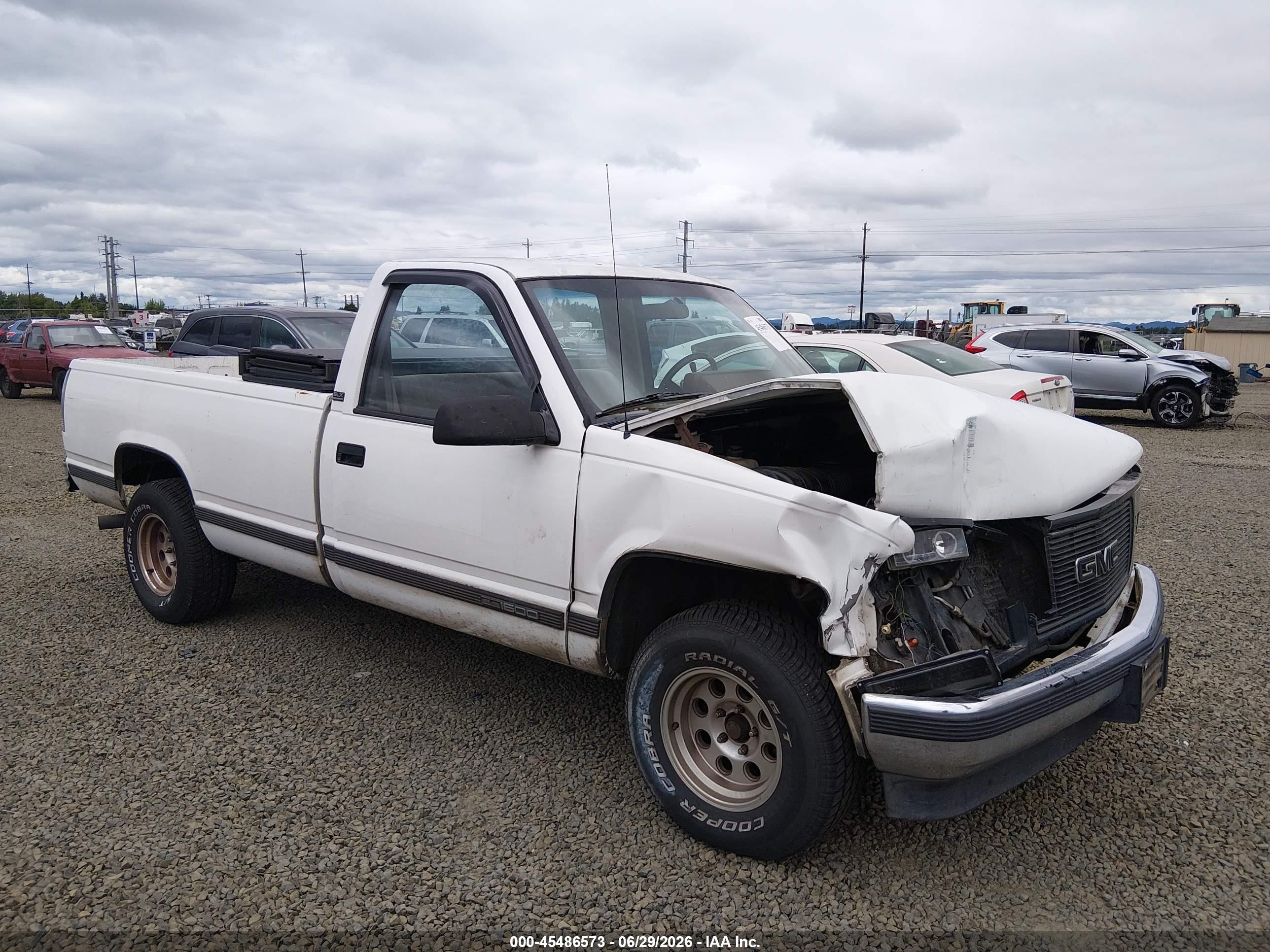 1990 GMC Sierra 1500, VIN 1GTDC14K2LE521965 — Front end
