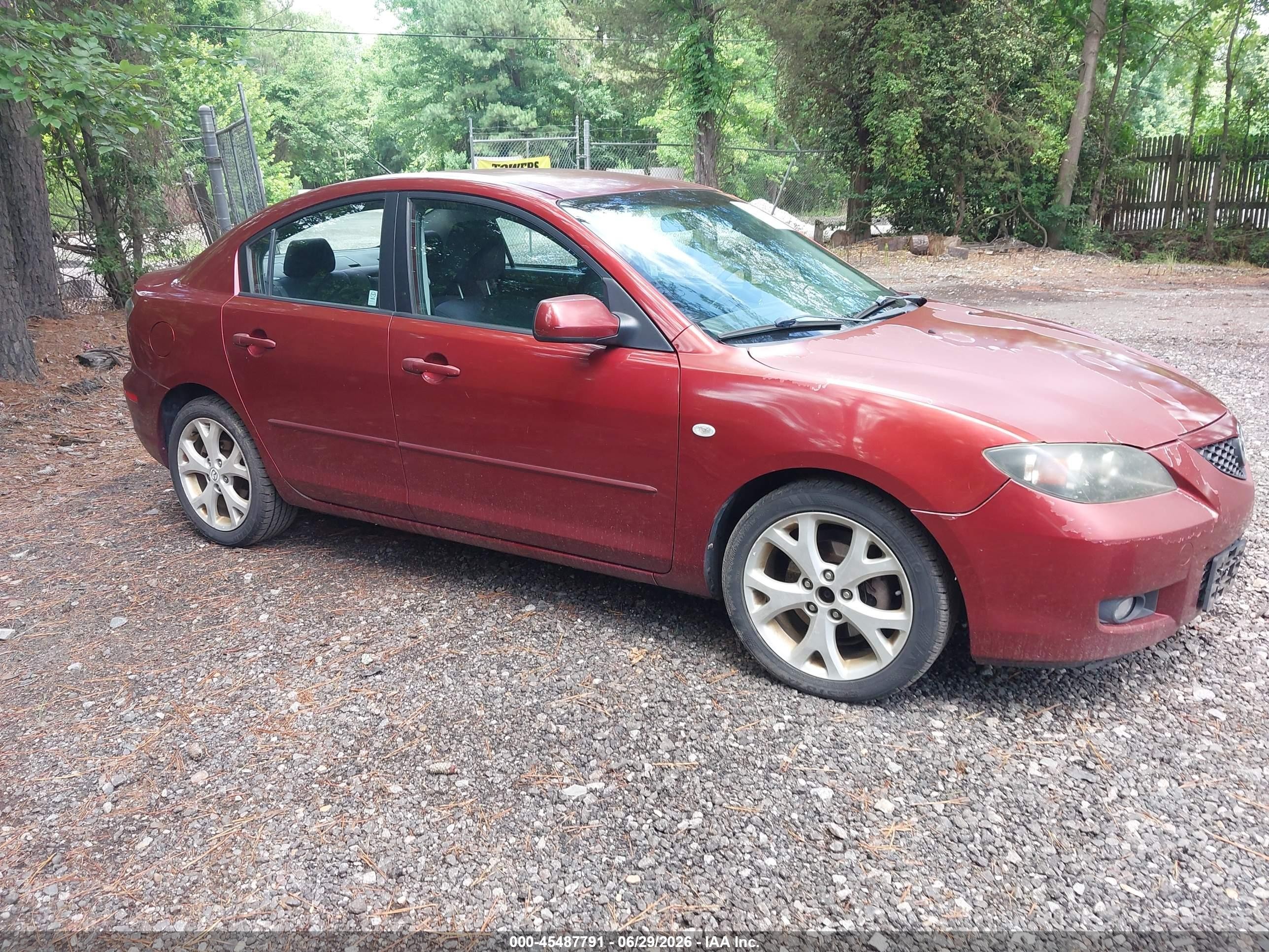 2009 Mazda 3 i Touring Value, VIN JM1BK32F191241739 — Бок